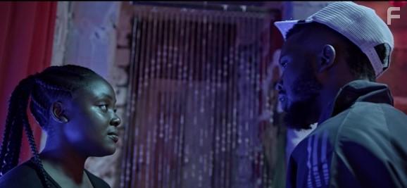 Bertha Robert and Akbar Thabiti in Binti (2021)