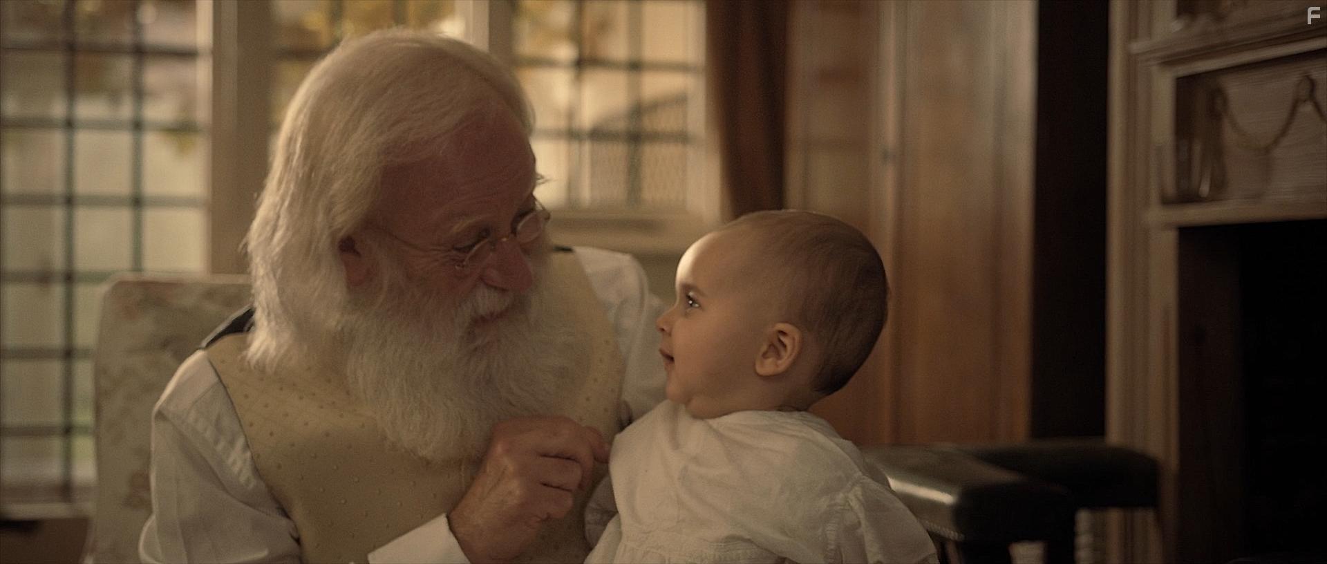 Melvyn Rawlinson and Elijah Blue Thomas in The Jack in the Box: Awakening (2022)