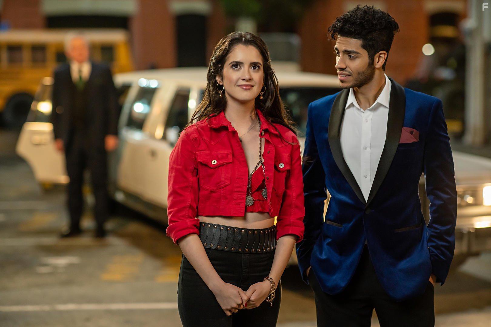 Laura Marano and Mena Massoud in The Royal Treatment (2022)