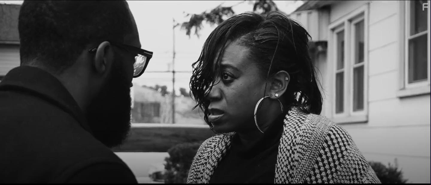 Omar Bullock and LaVeta Cameron in Regrets (2021)