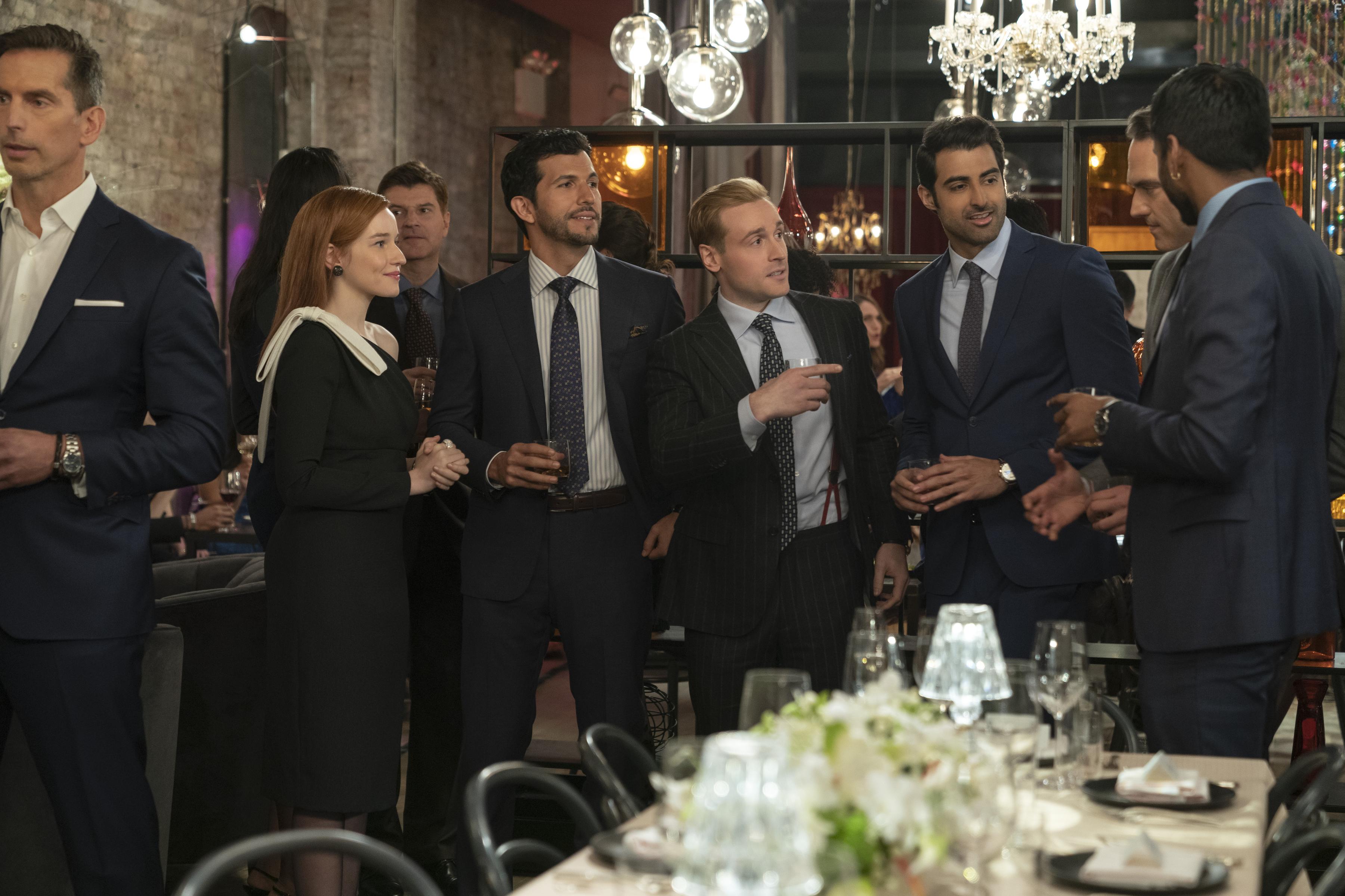 Niraj Arjan, Chris Cafero, Julia Garner, Gabriel Sloyer, and Kevin Mulleady in Inventing Anna: A Wolf in Chic Clothing (2022)