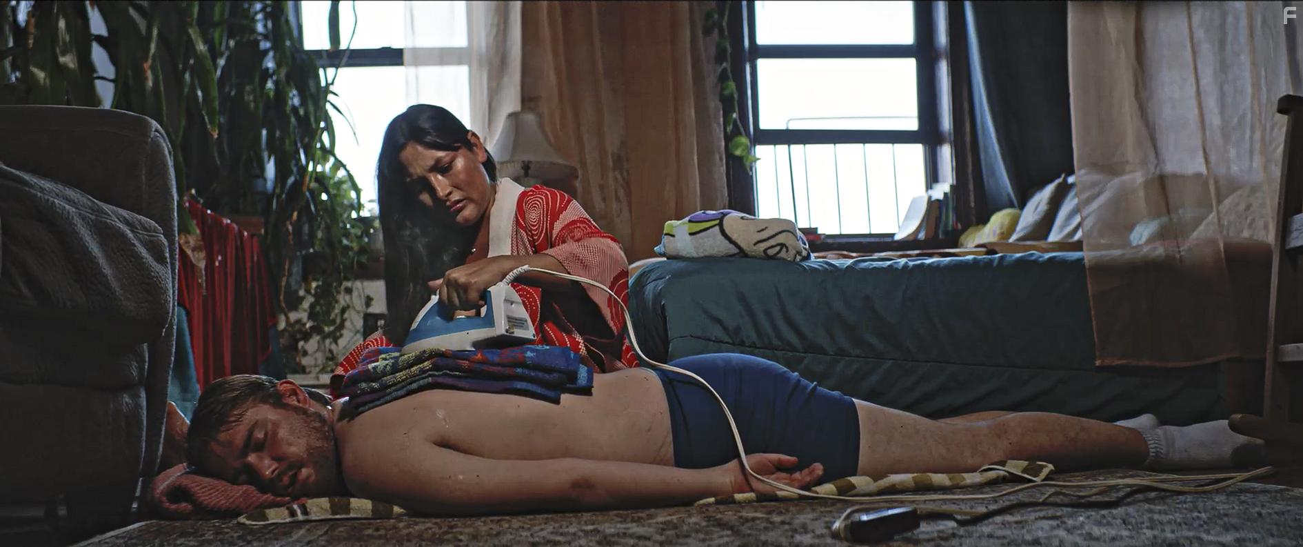 Magaly Solier and Simon Kser in The Saint of the Impossible (2020)