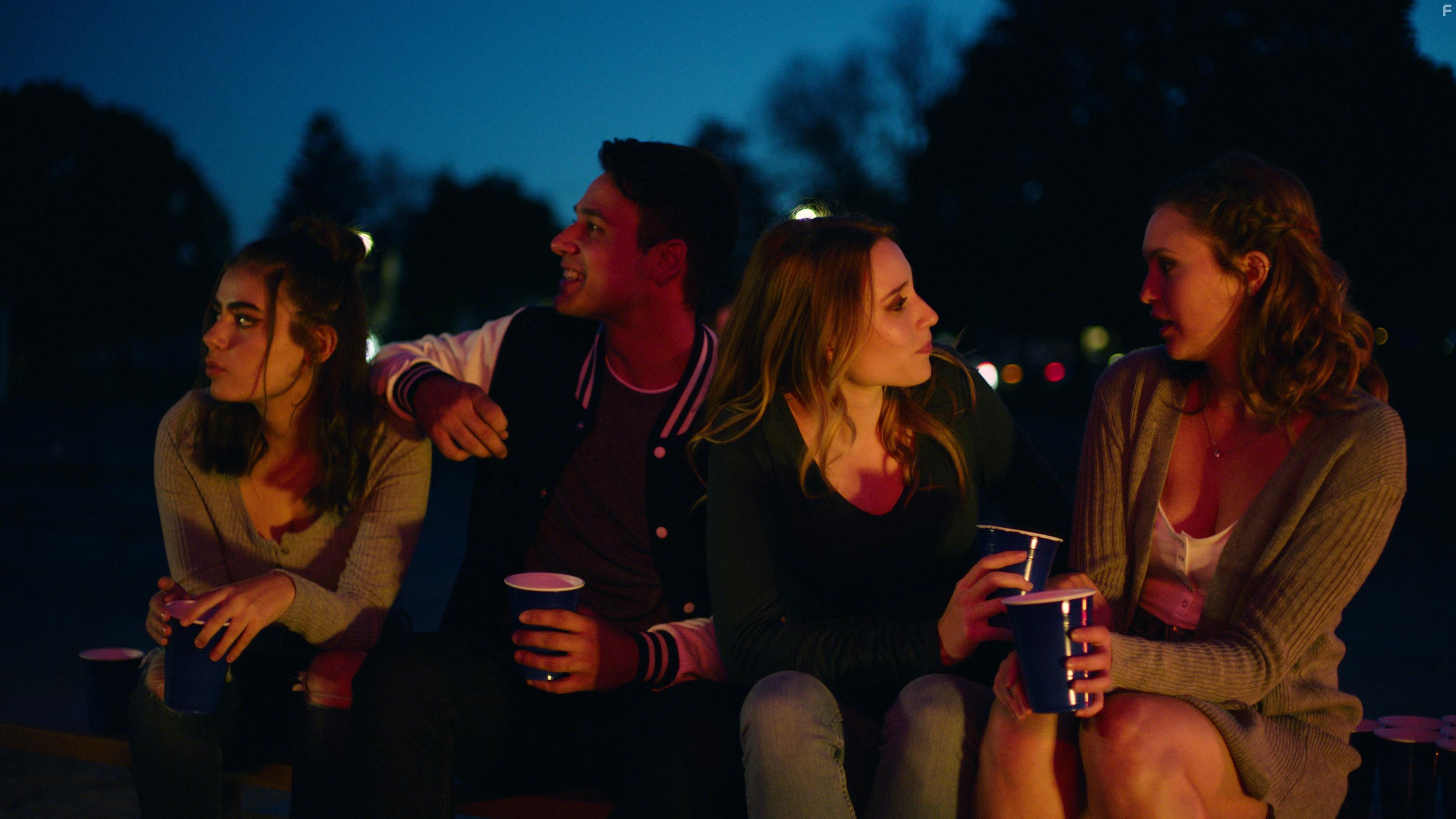 Michael Pavone, Emma Jessop, Tyler Aser, and Andrea Figliomeni in The Mystery of Her (2022)