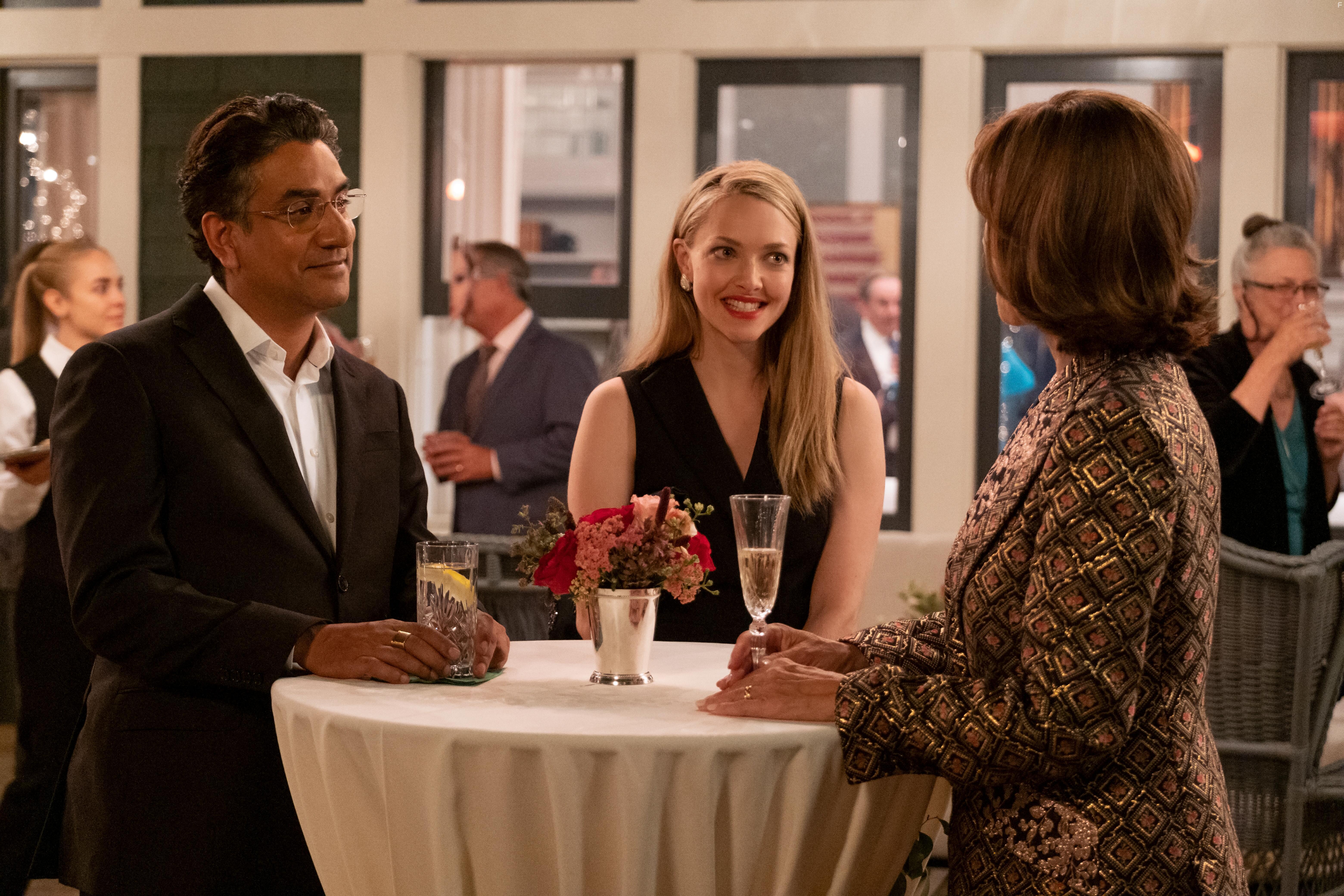 Anne Archer, Naveen Andrews, and Amanda Seyfried in The Dropout (2022)