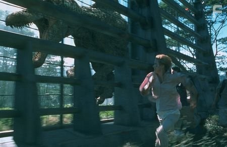 Amanda Kirby tries to outrun the Spinosaurus