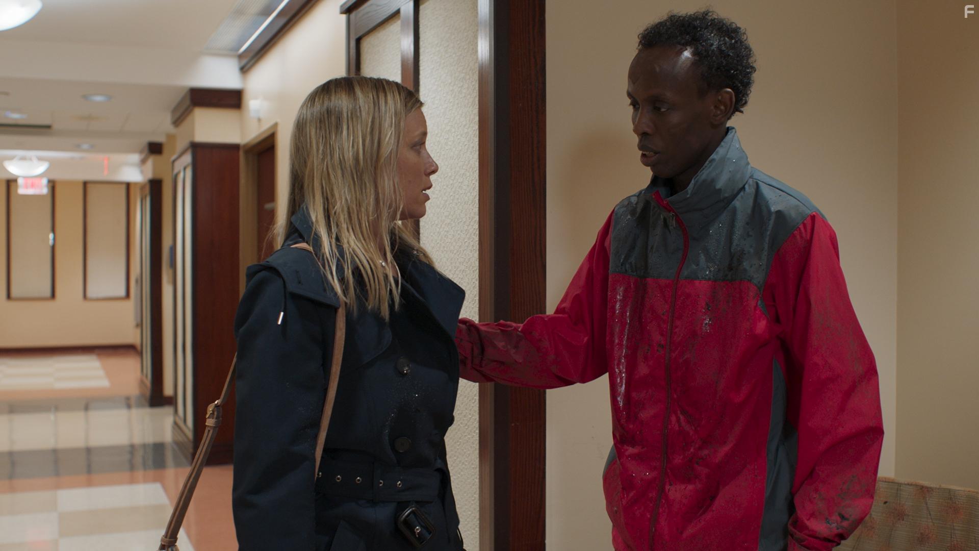 Amy Smart and Barkhad Abdi in Tyson's Run (2022)