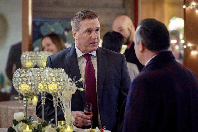 Lochlyn Munro and Jason Schombing in Dying for Chocolate: A Curious Caterer Mystery (2022)