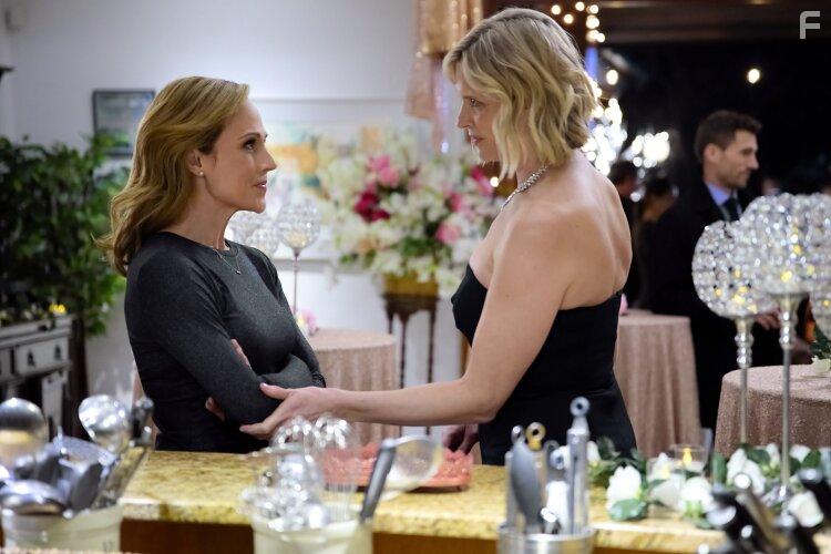 Kendall Cross, Nikki Deloach, and Andrew W. Walker in Dying for Chocolate: A Curious Caterer Mystery (2022)