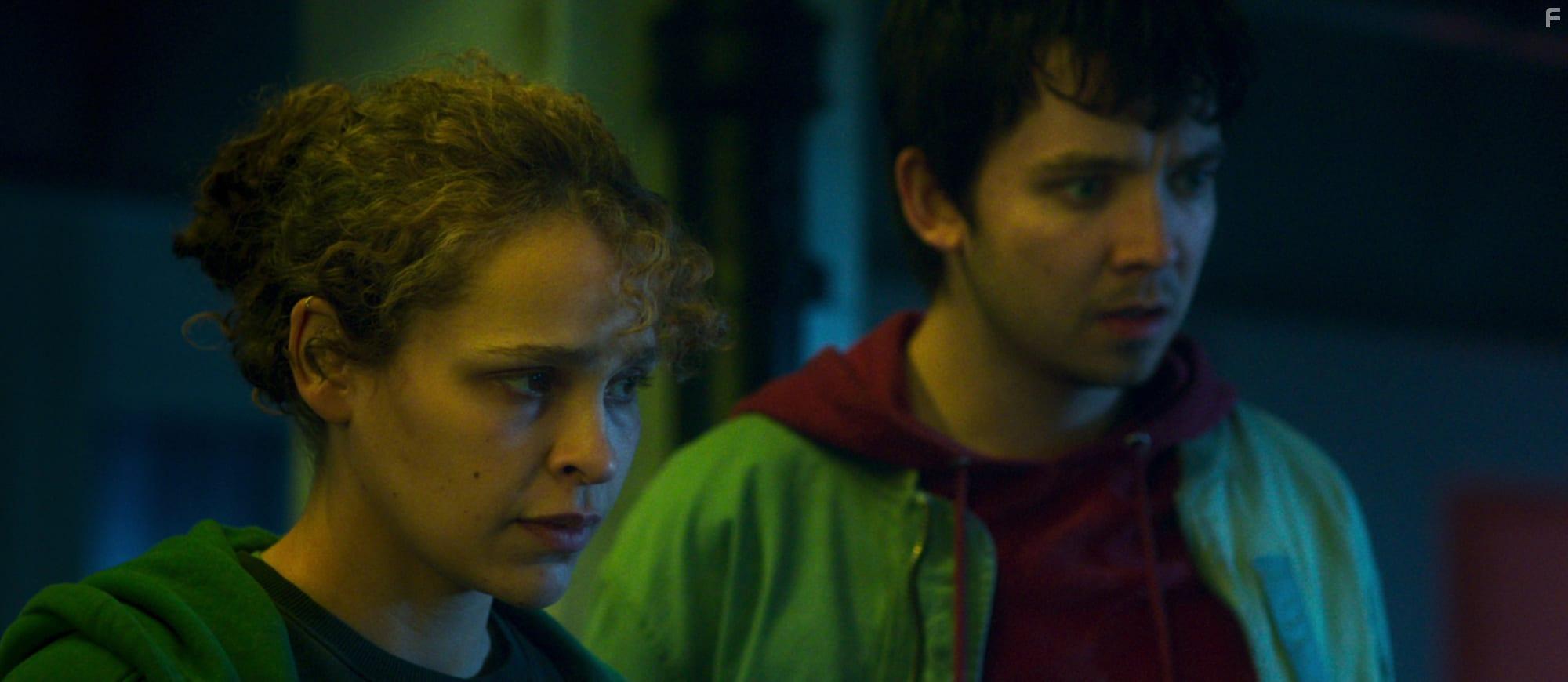 Asa Butterfield and Iola Evans in Choose or Die (2022)