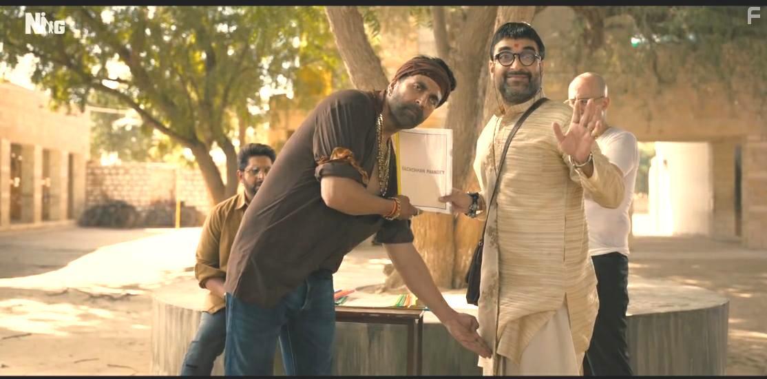 Akshay Kumar and Pankaj Tripathi in Bachchhan Paandey (2022)