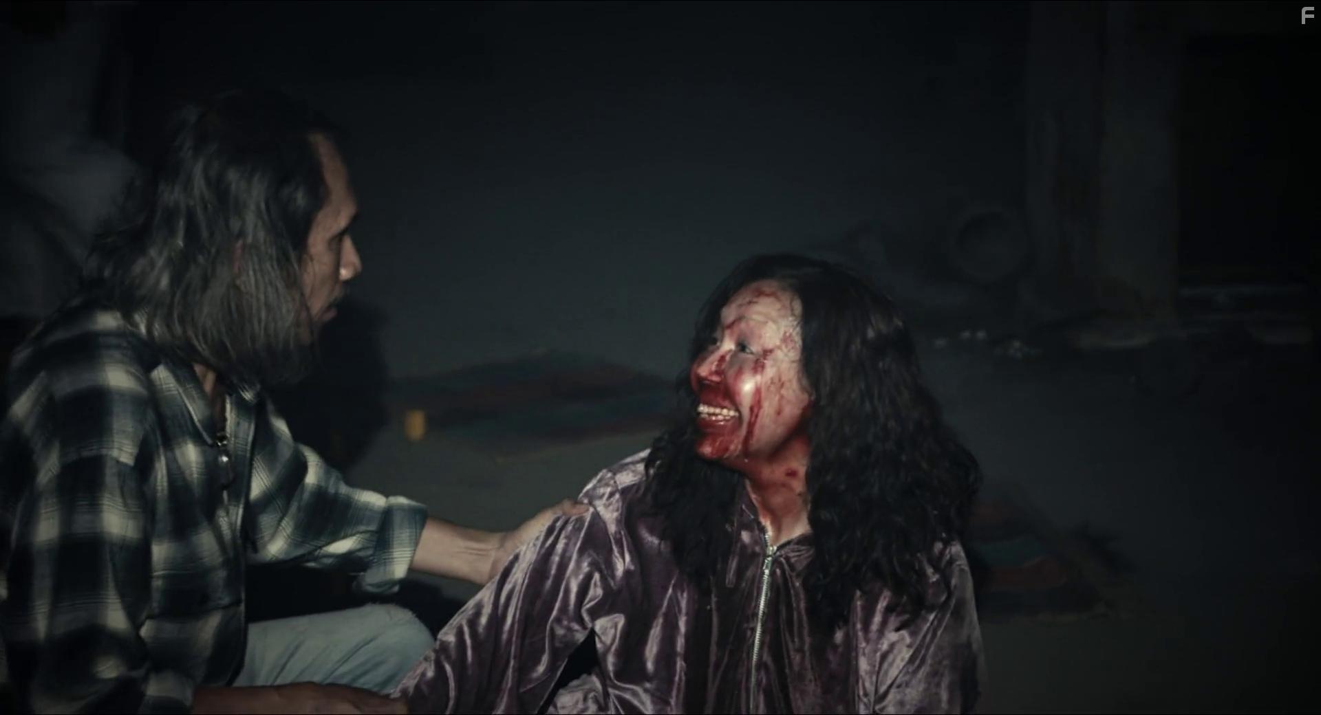 Sirani Yankittikan and Yasaka Chaisorn in The Medium (2021)