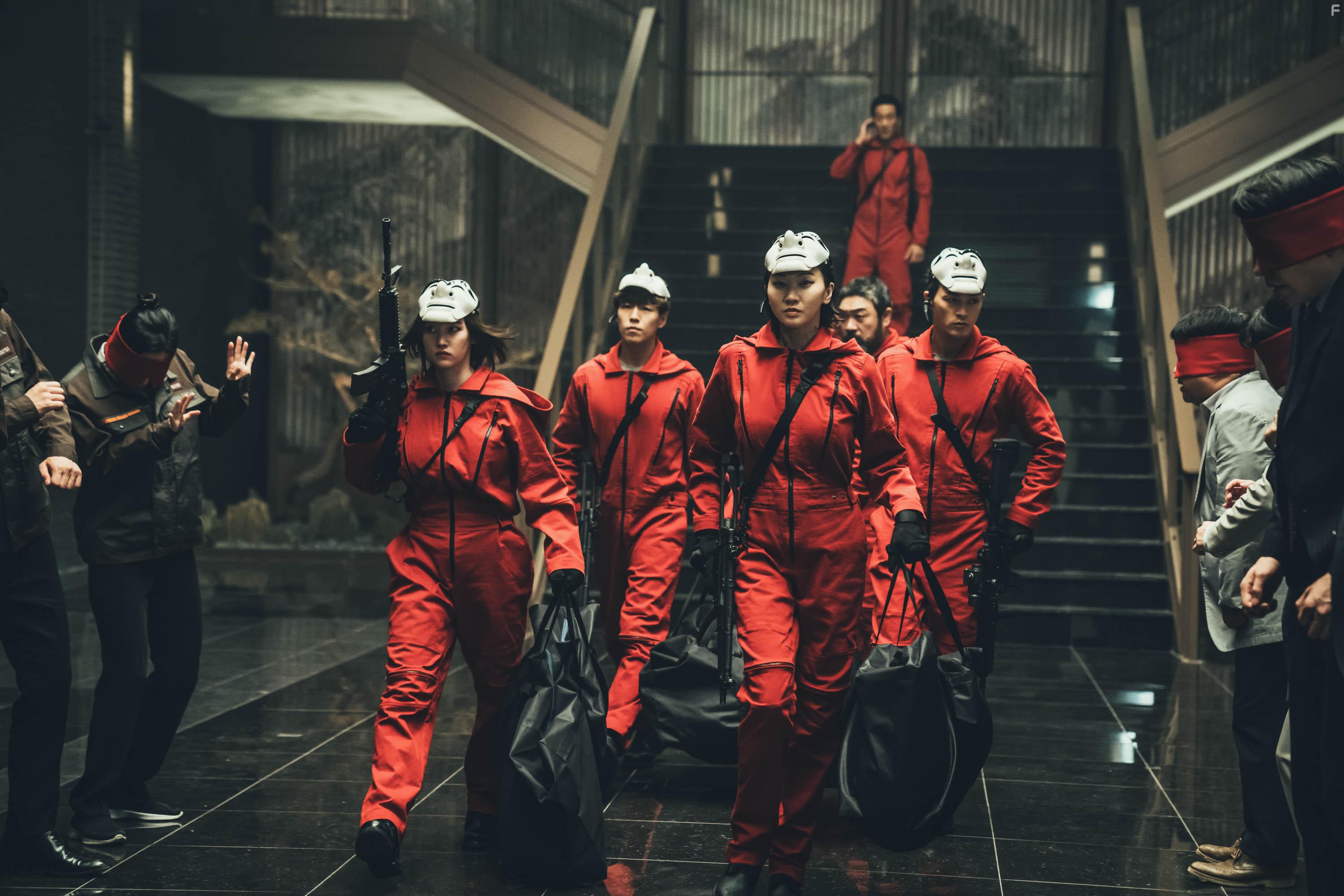 Nairobi, Lee Won-Jong, Jang Yoon-ju, Moscow, Ji Hun Kim, Park Hae-soo, and Lee Hyun-woo in La casa de papel: Korea (2022)