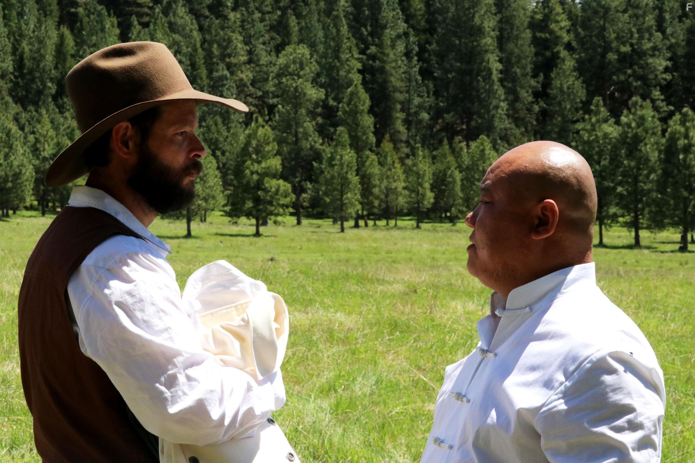 Evan Disney and Sean Eden Yi in Eye for Eye (2022)