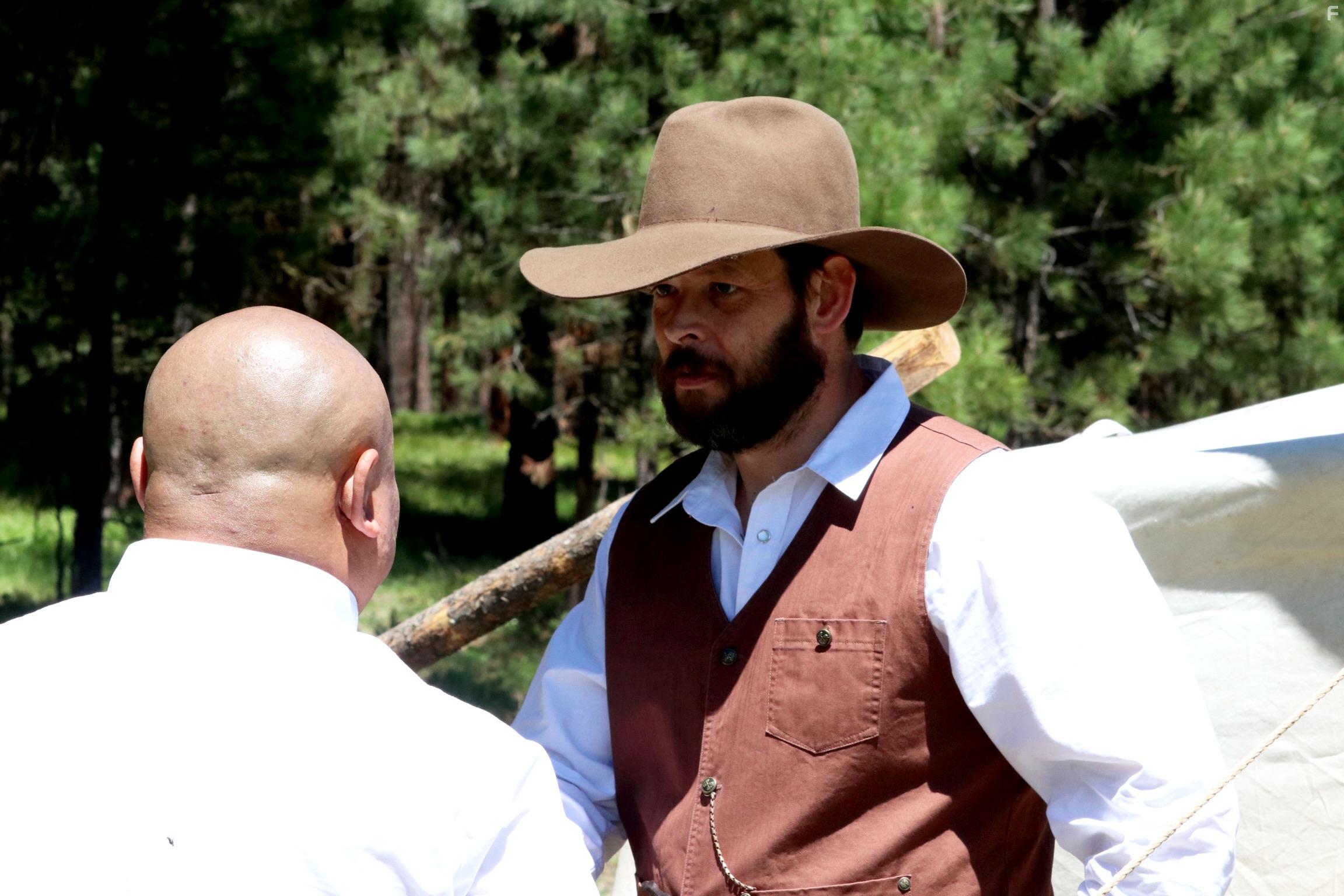 Evan Disney and Sean Eden Yi in Eye for Eye (2022)