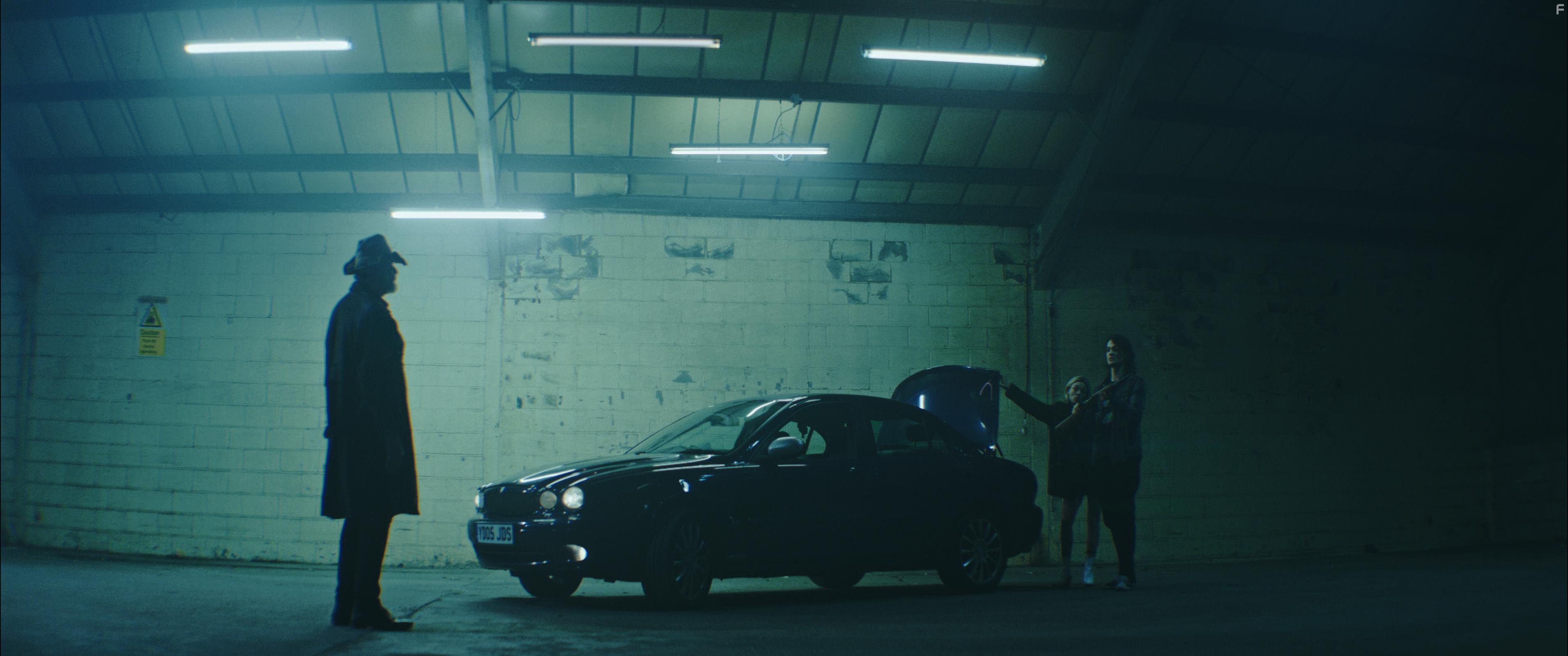 Patrick Bergin, Skye Lourie, and George Webster in God's Petting You (2022)
