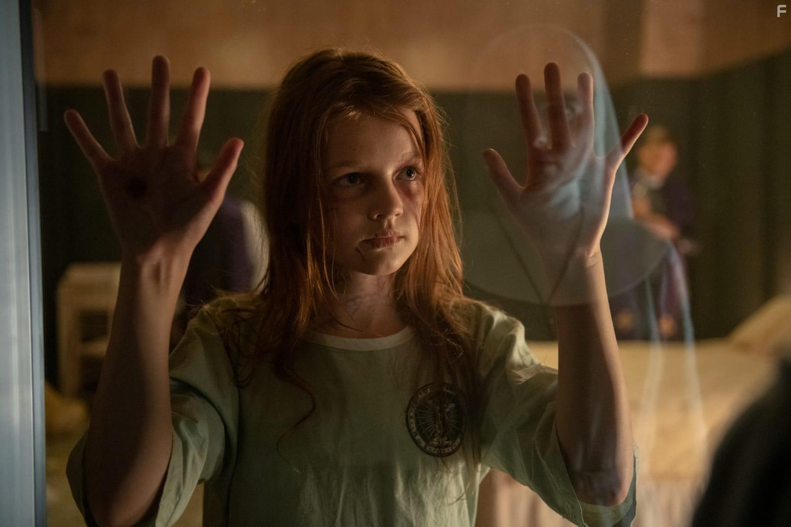 Posy Taylor and Jacqueline Byers in The Devil's Light (2022)