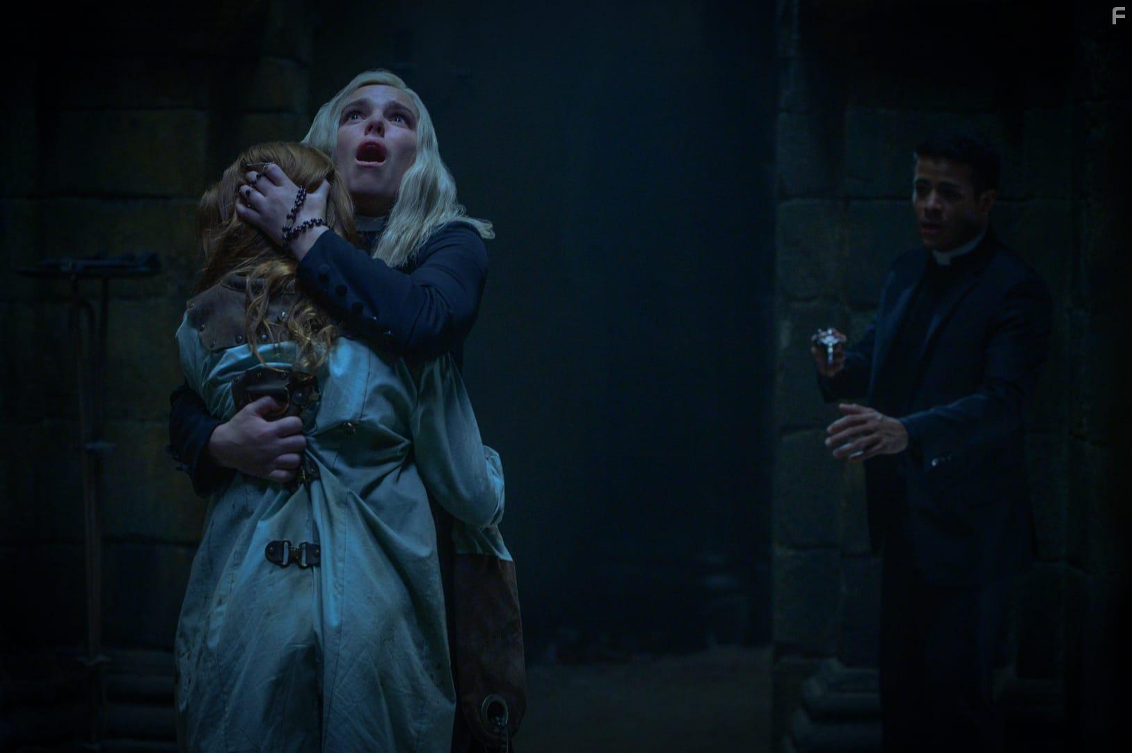 Jacqueline Byers and Christian Navarro in The Devil's Light (2022)