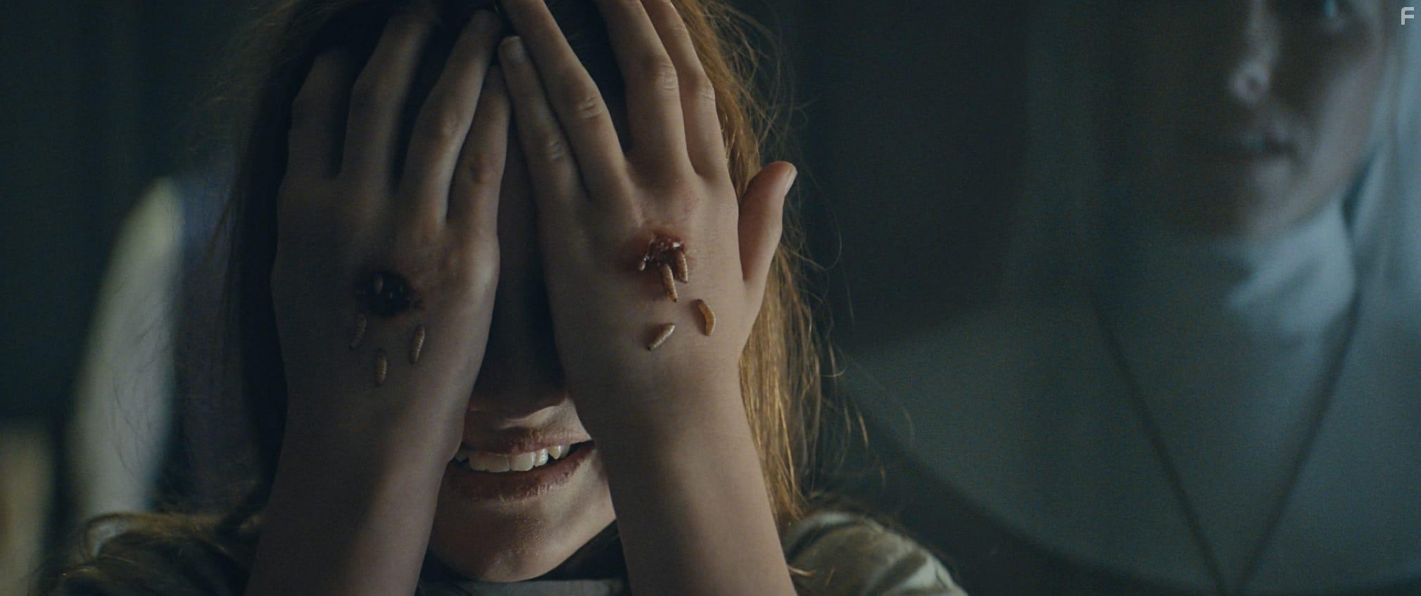 Posy Taylor and Jacqueline Byers in The Devil's Light (2022)