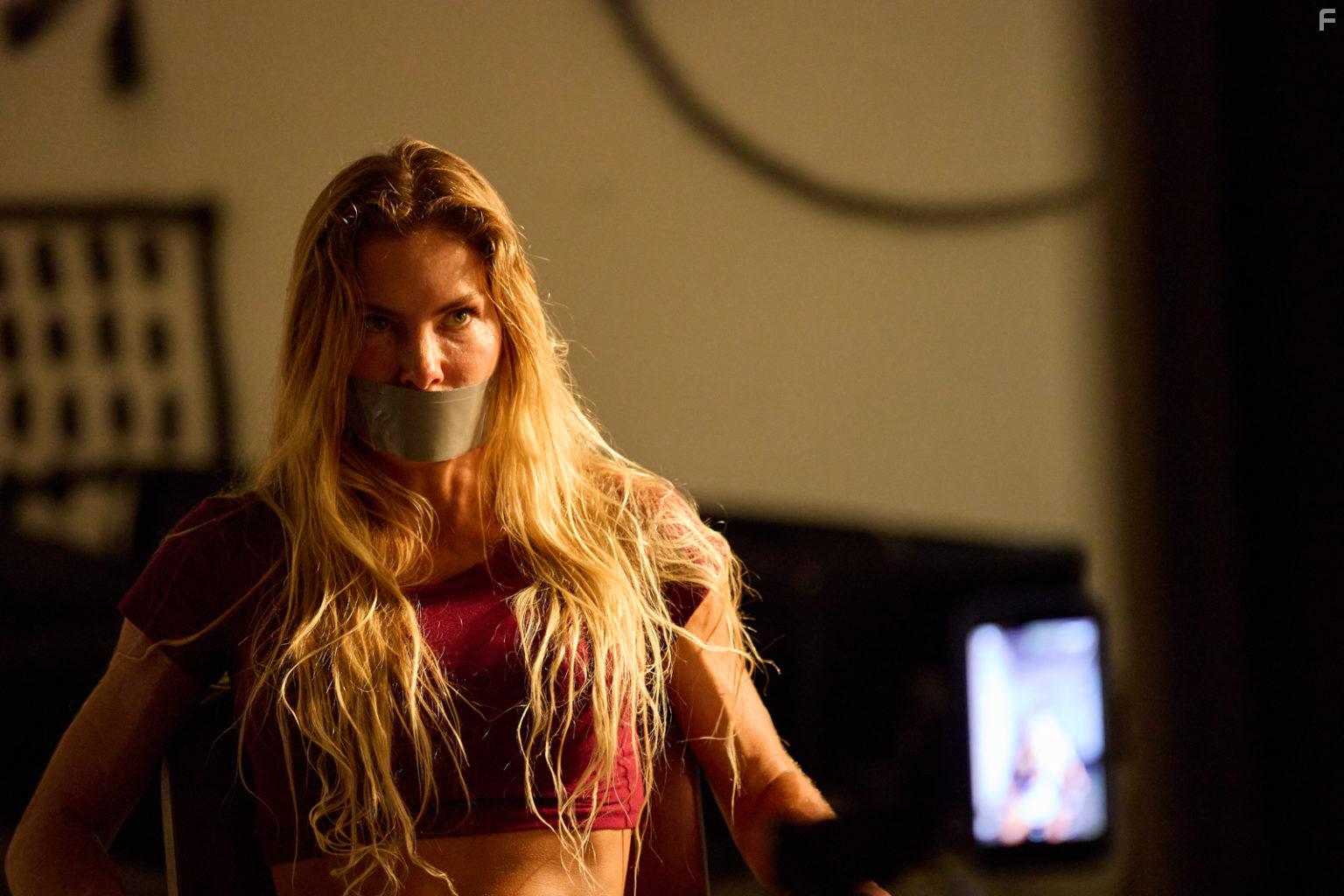 Kelly Greyson in Fortress: Sniper's Eye (2022)