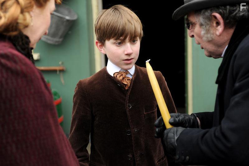 Jude Wright in The Christmas Candle (2013)