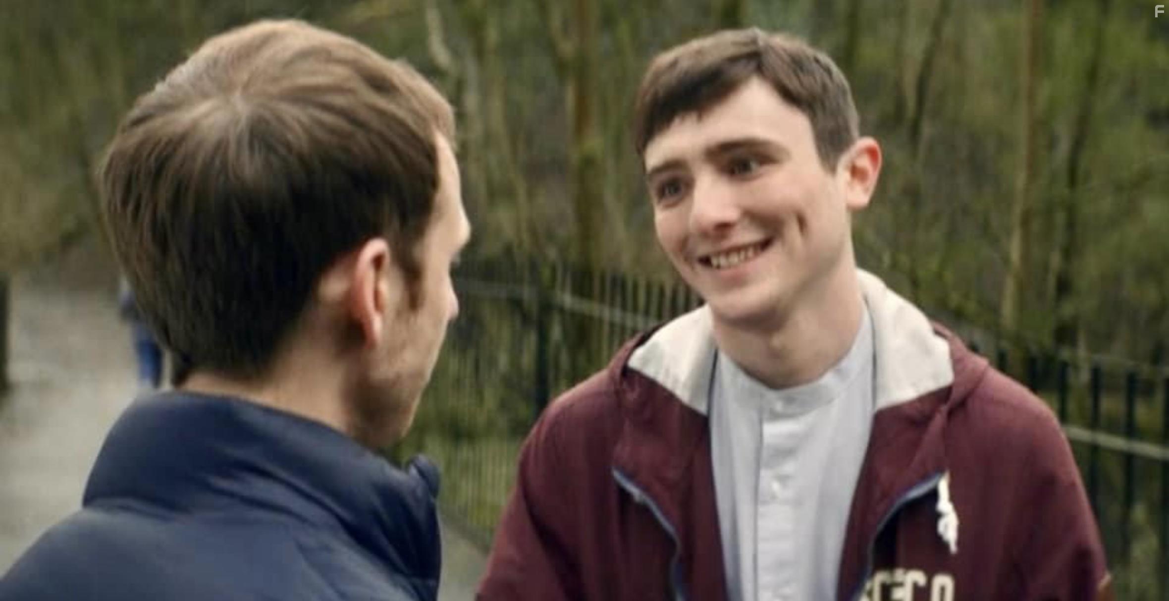 Robert Emms and Leo Flanagan in Four Lives (2022)