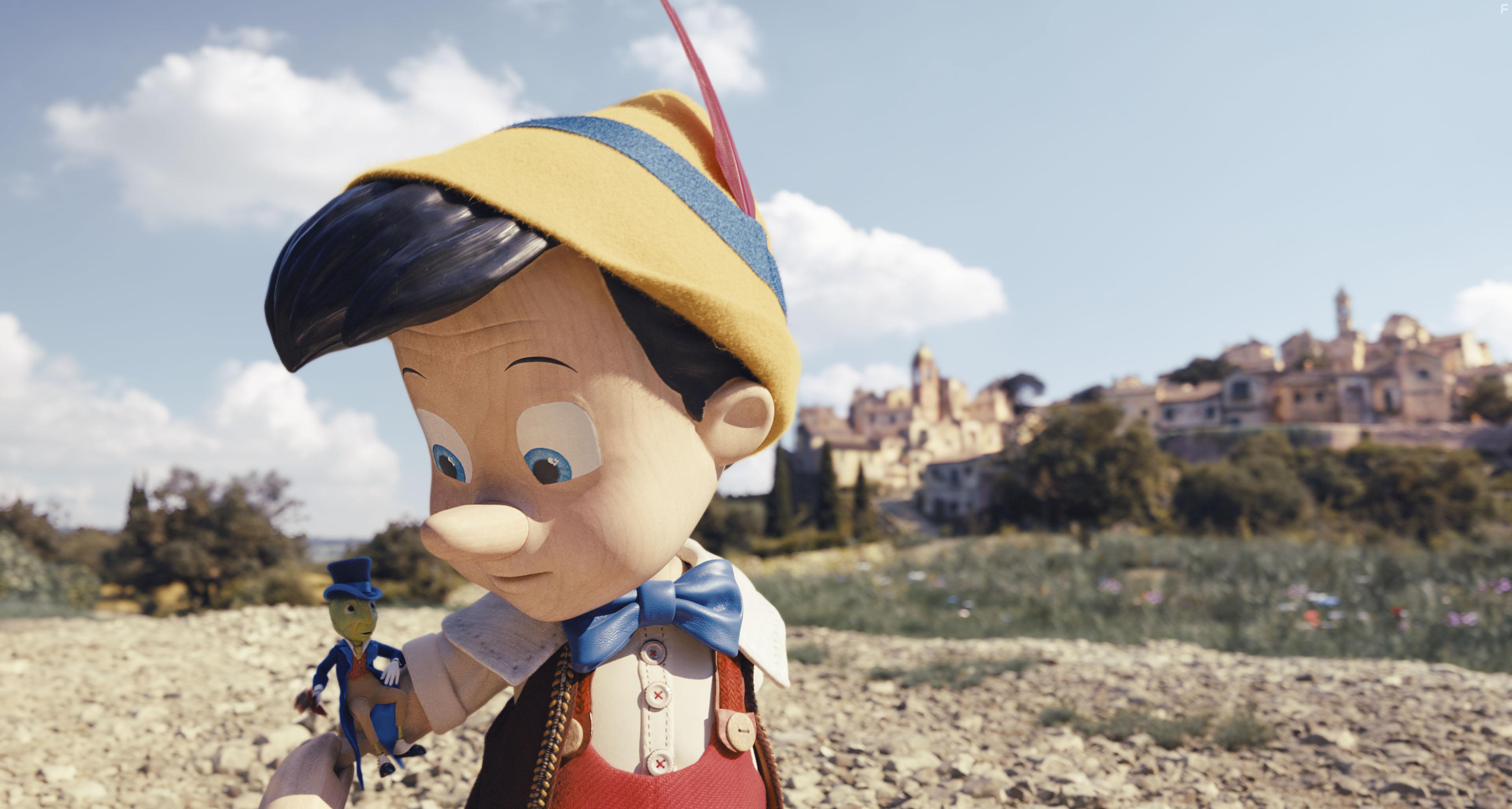 Joseph Gordon-Levitt and Benjamin Evan Ainsworth in Pinocchio (2022)