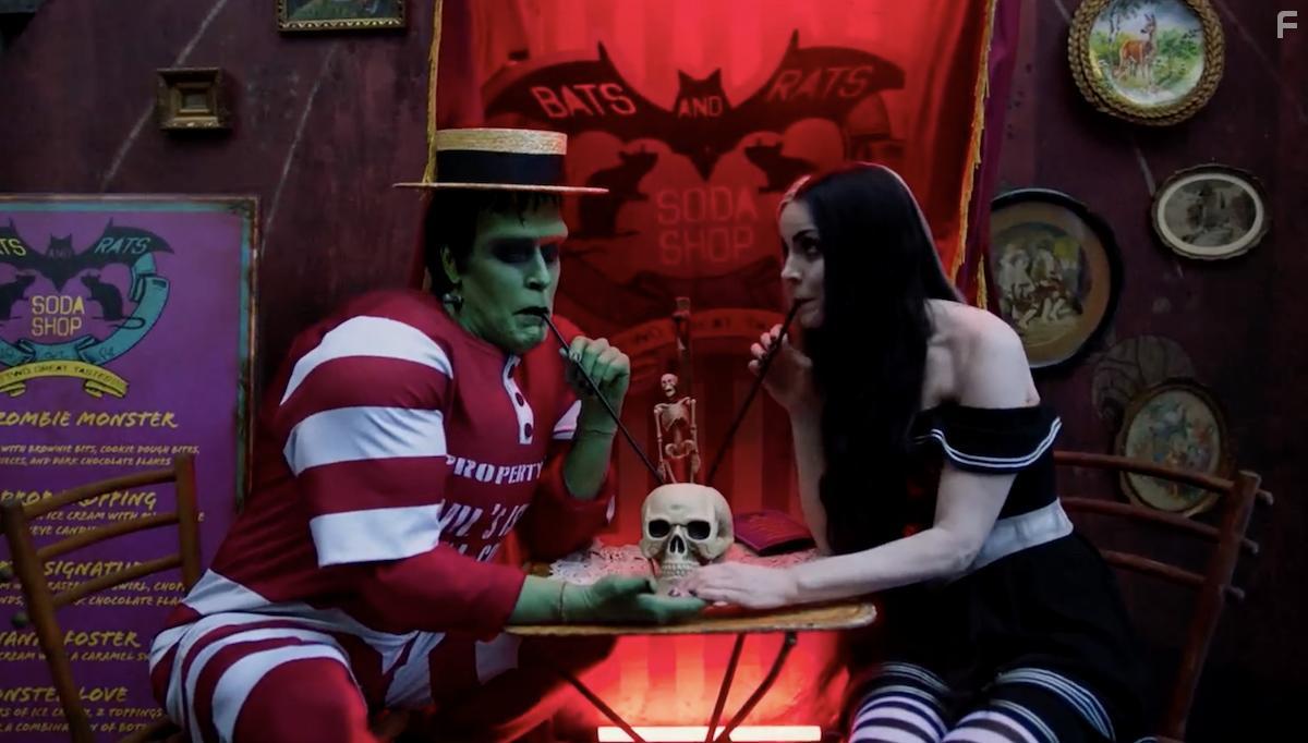 Sheri Moon Zombie and Jeff Daniel Phillips in The Munsters (2022)