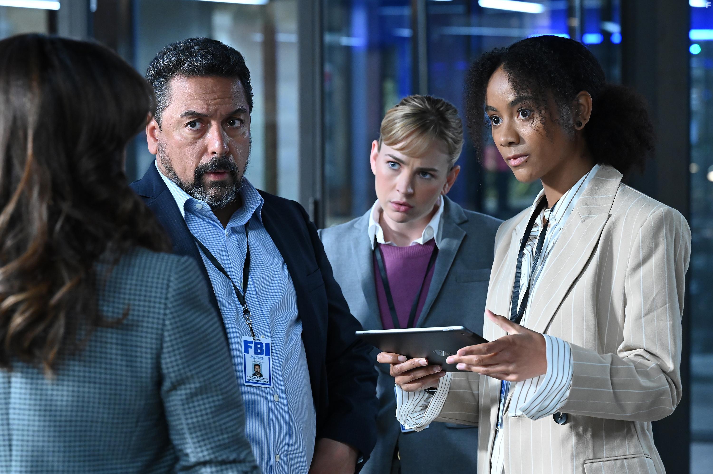 Felix Solis, Britt Robertson, and Michelle Nuez in The Rookie: Feds (2022)