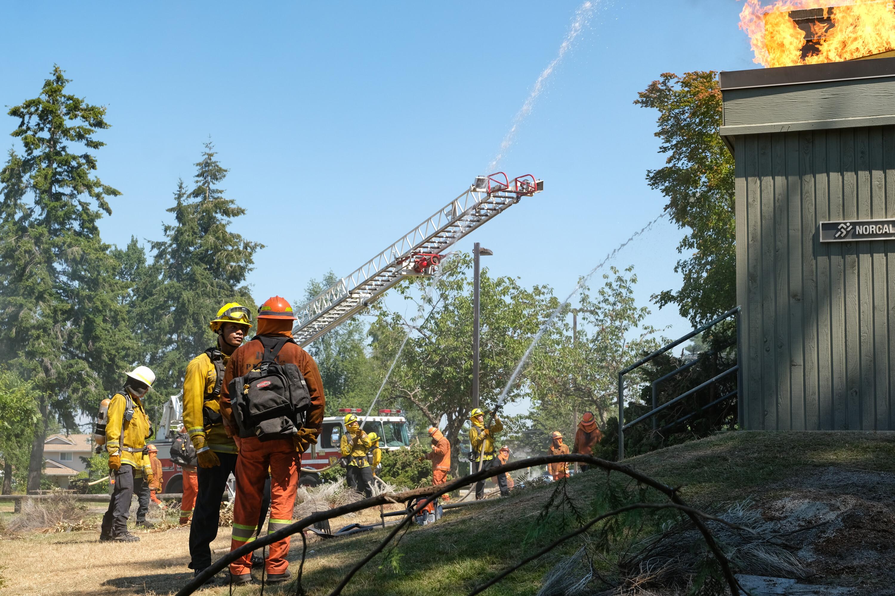 Max Thieriot and Jordan Calloway in Fire Country (2022)