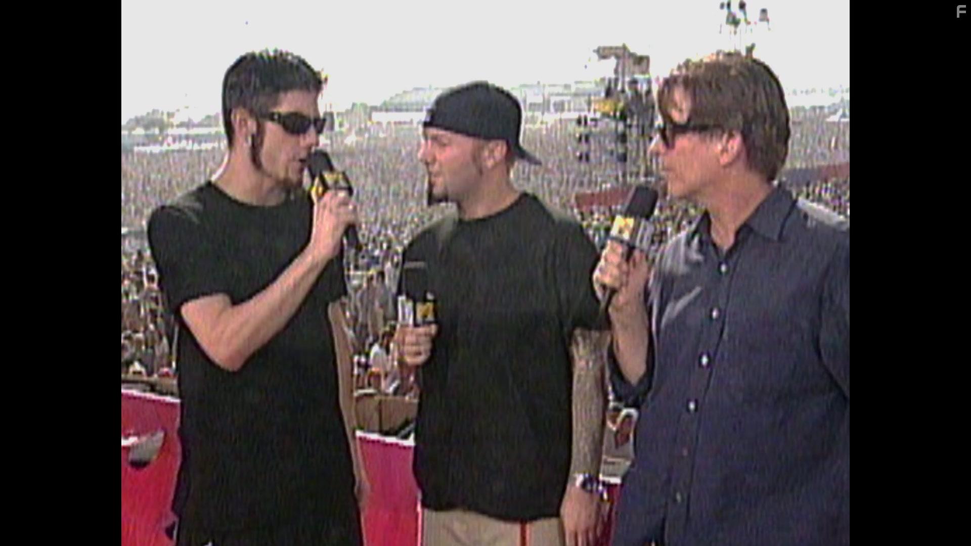 Fred Durst and Wes Borland in Clusterf**k: Woodstock '99 (2022)