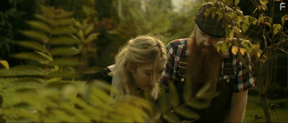 Chynna Rae Shurts and Tim Coyle in A Haunting in Ravenwood (2021)