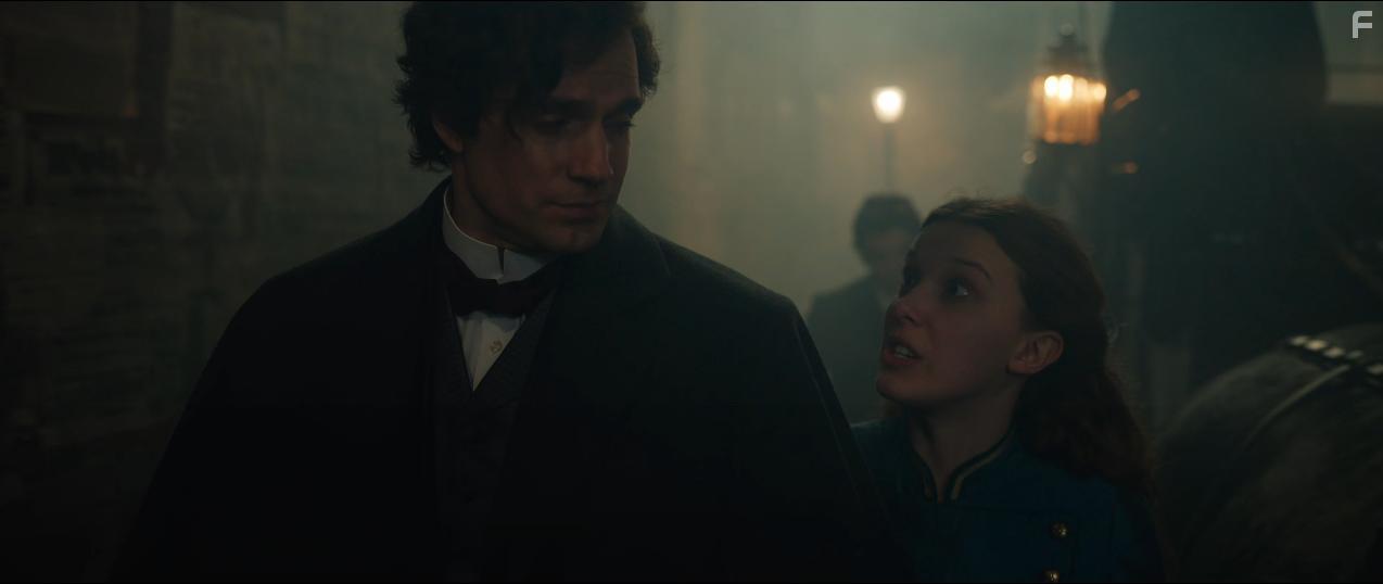 Henry Cavill and Millie Bobby Brown in Enola Holmes 2 (2022)