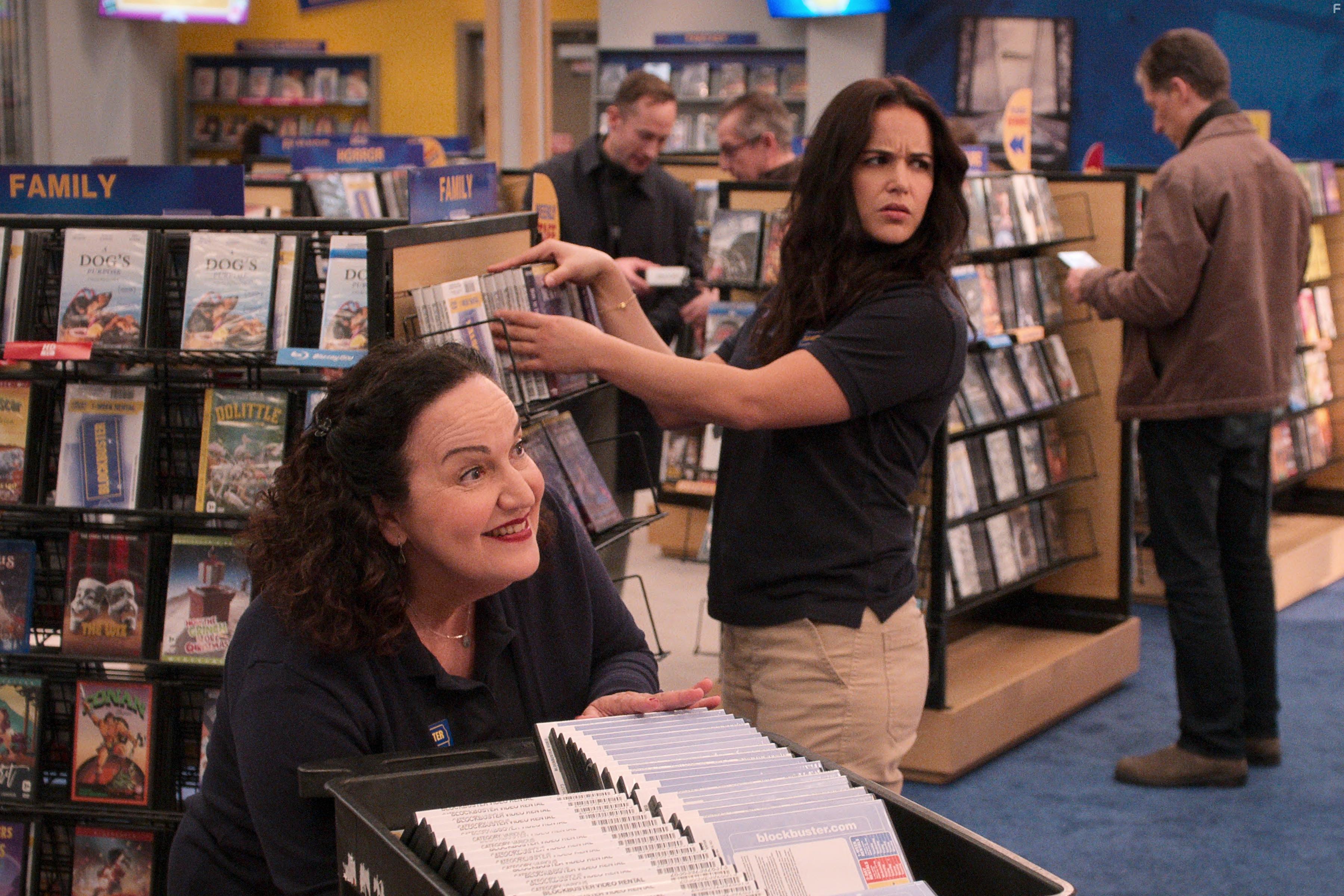 Melissa Fumero and Olga Merediz in Blockbuster (2022)