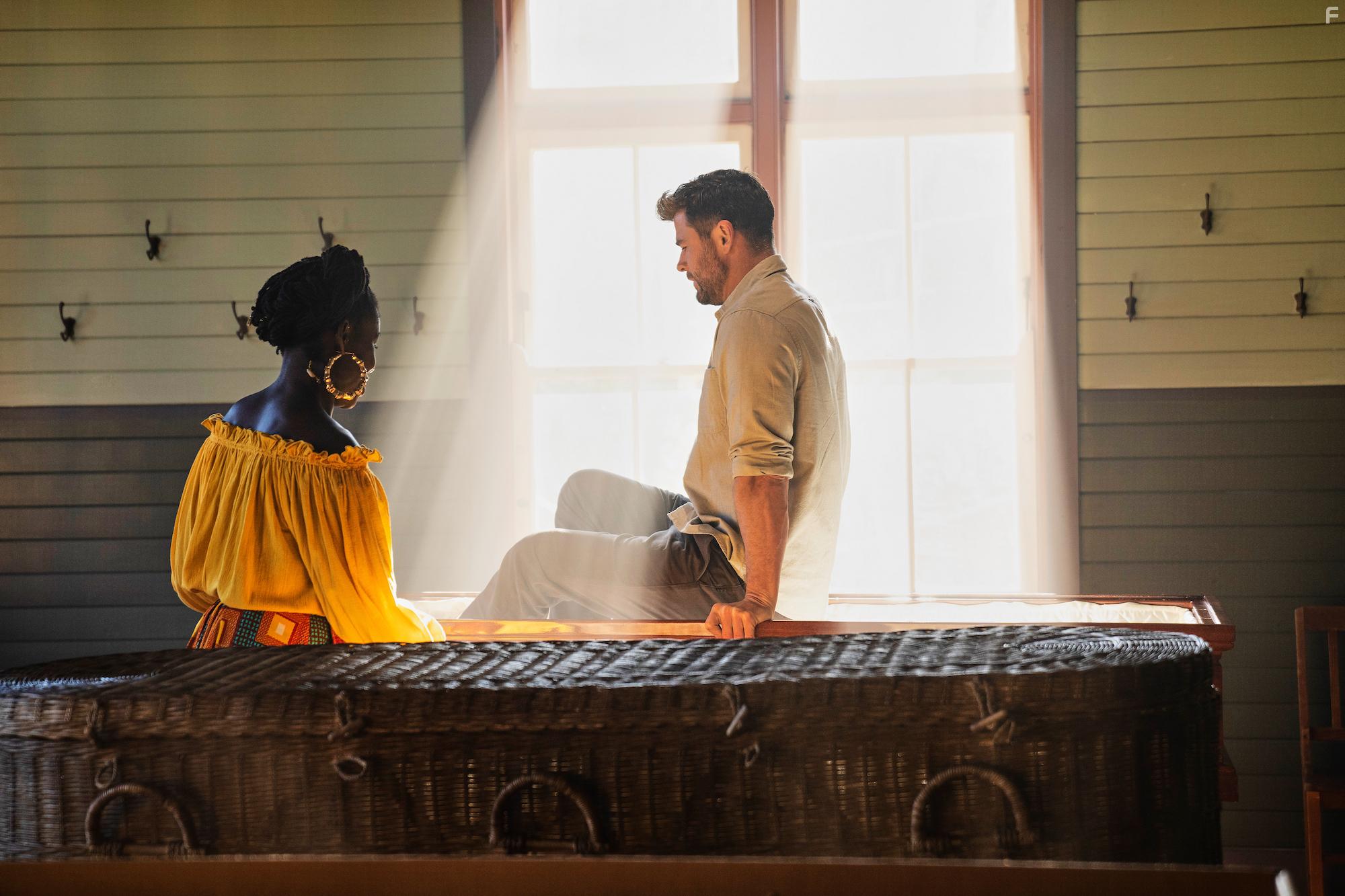 Alua Arthur and Chris Hemsworth in Limitless (2022)