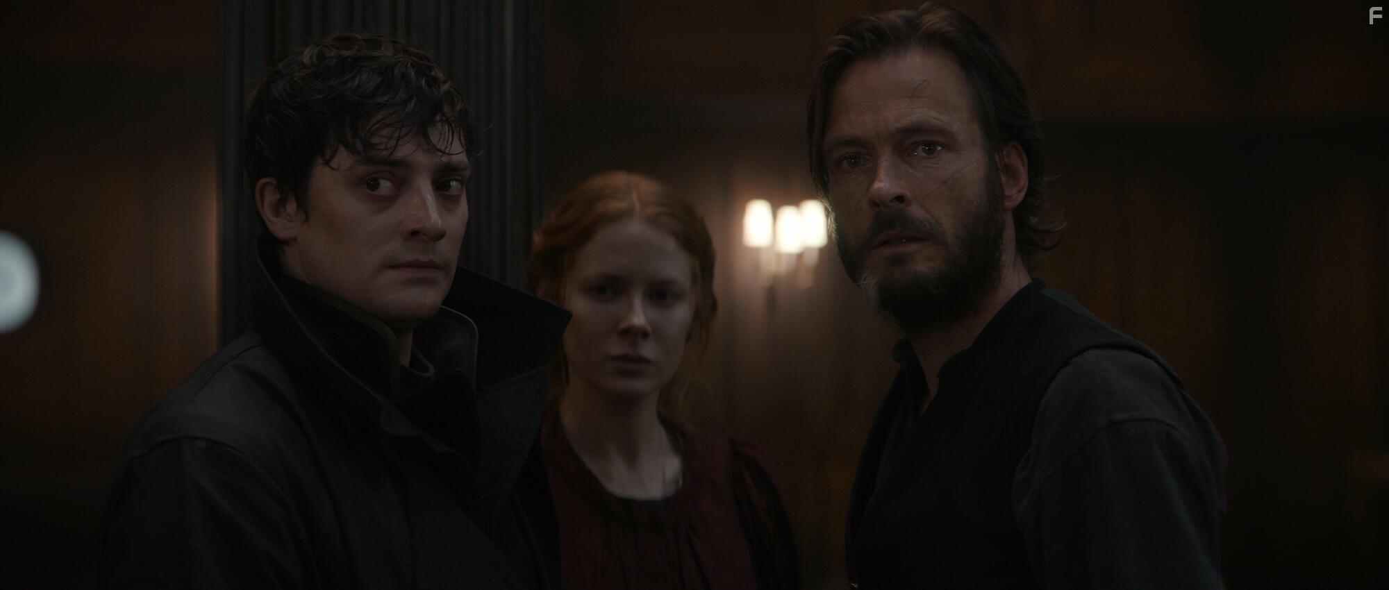 Andreas Pietschmann, Emily Beecham, and Aneurin Barnard in 1899 (2022)