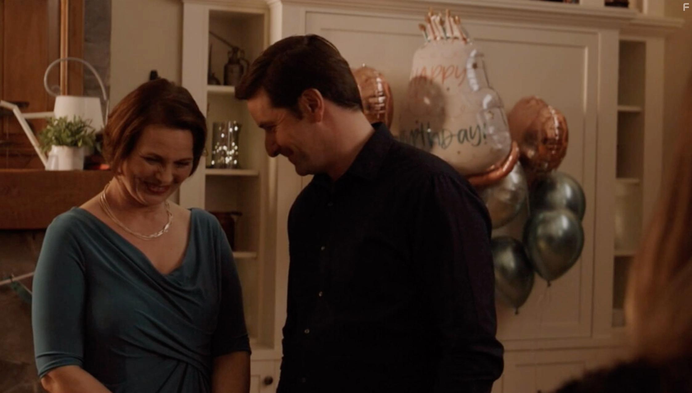 Jay Hindle and Corina Akeson in Ties that Kill (2022)