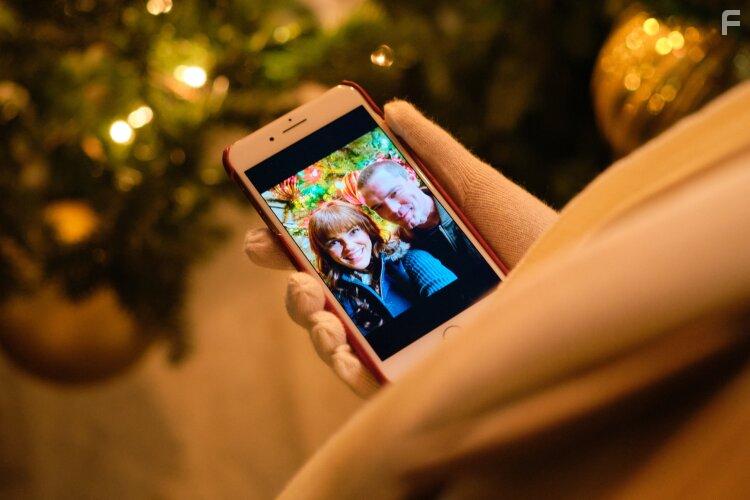 Erin Cahill and Charlie Weber in Christmas Bedtime Stories (2022)