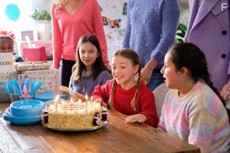 Erin Cahill, Tegan Moss, Alice Comer, and Victoria Dunsmore in Christmas Bedtime Stories (2022)