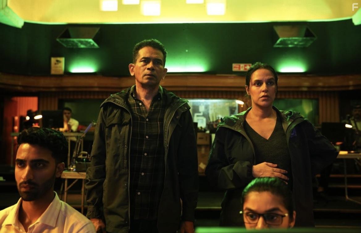 Atul Kulkarni and Neha Dhupia in A Thursday (2022)