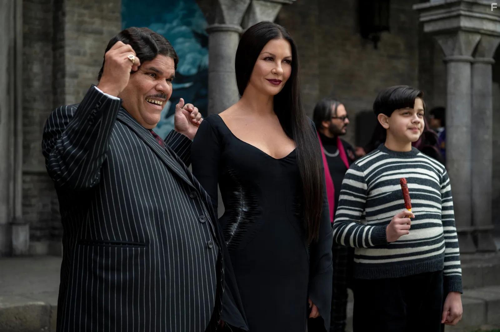 Catherine Zeta-Jones, Luis Guzmn, and Isaac Ordonez in Wednesday (2022)