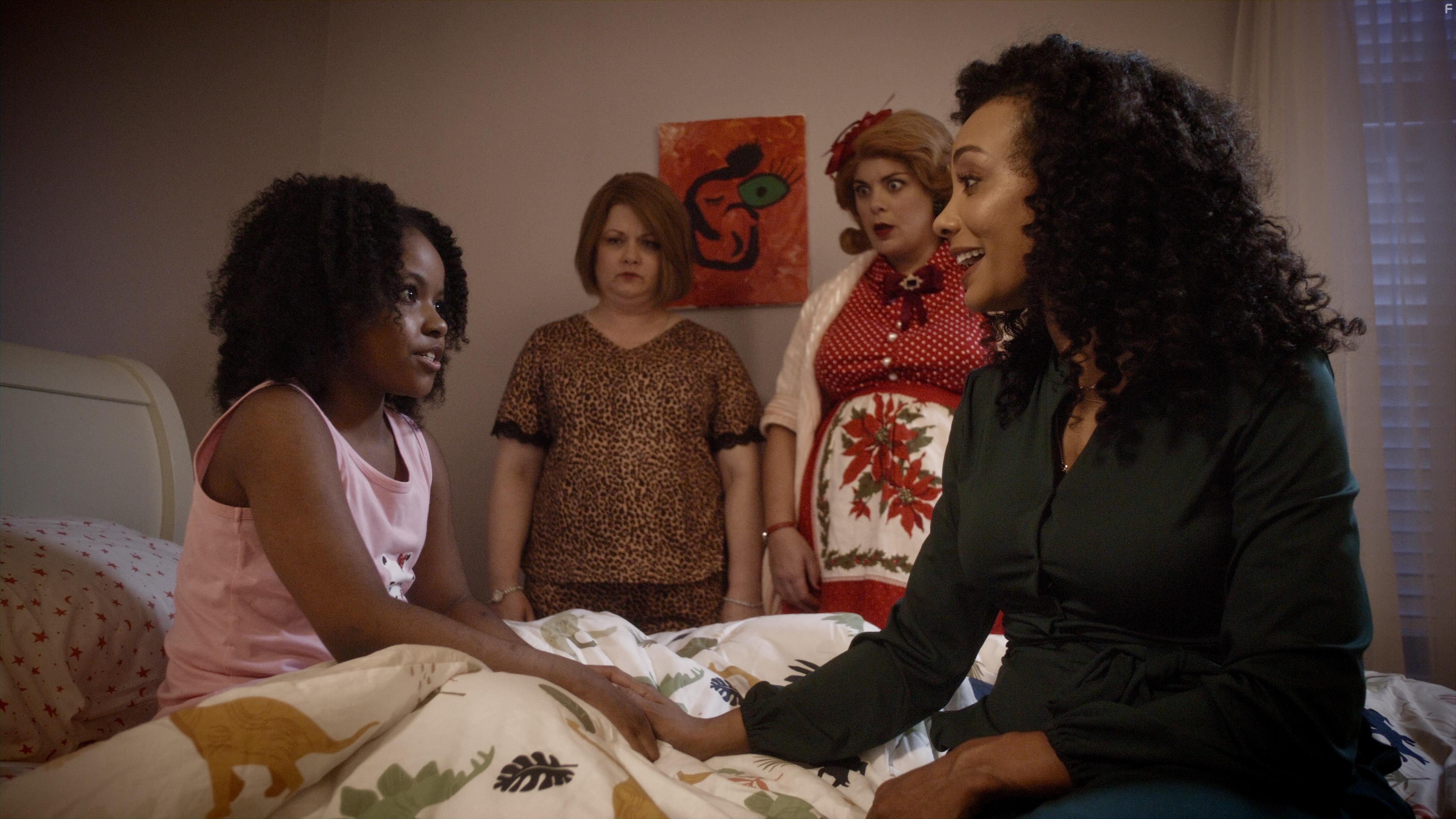Amina Massai, Michele Simms, Ashley B. Jones, and Leyla Lawrence in A Christmas Karen (2022)