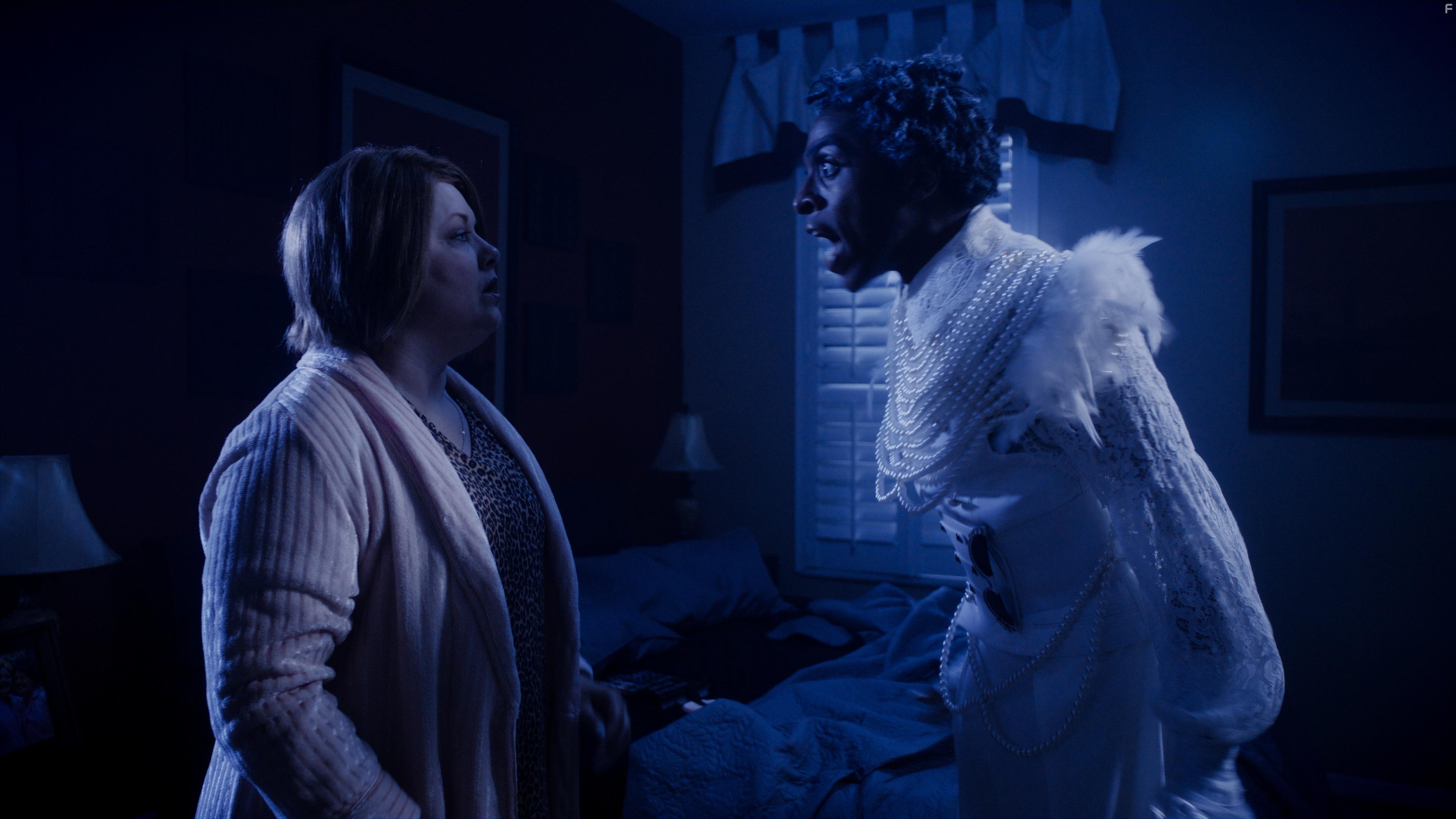 Michele Simms and Rolin Alexis in A Christmas Karen (2022)