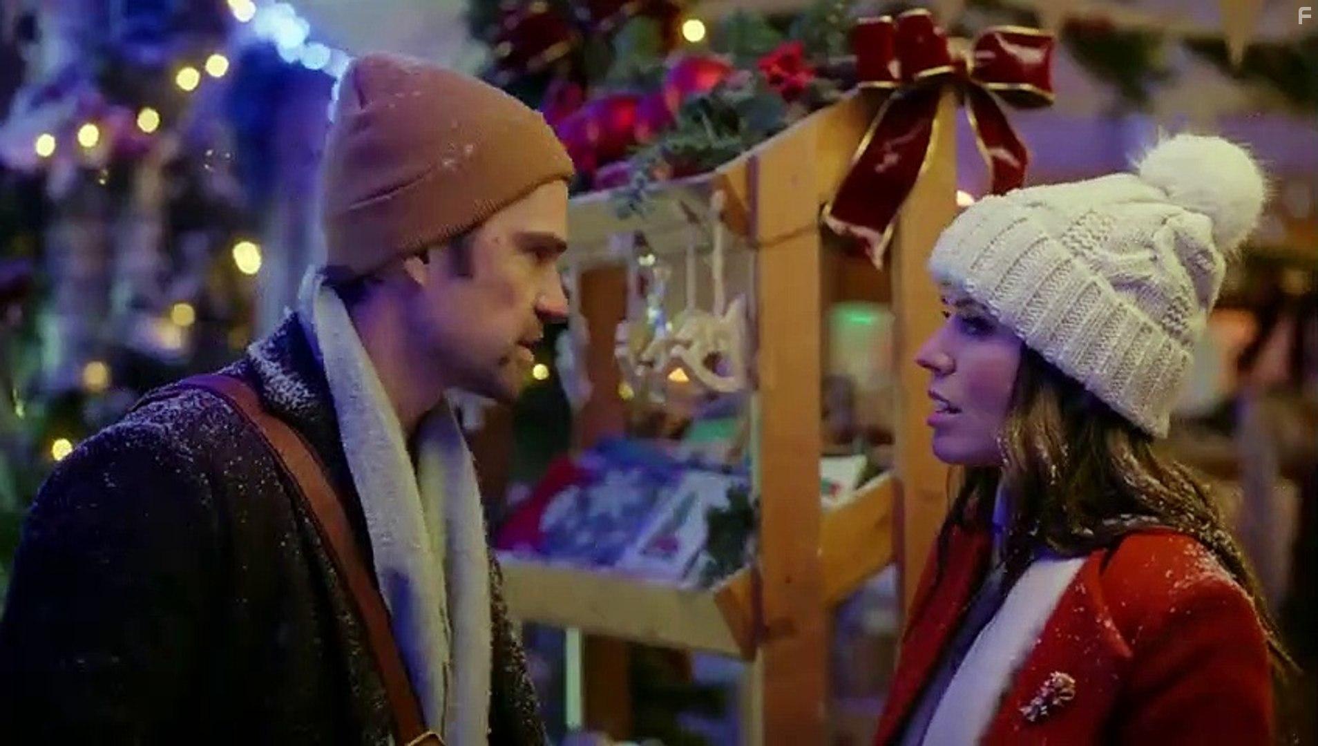 Corey Sevier and Emily Alatalo in Christmas Plus One (2022)