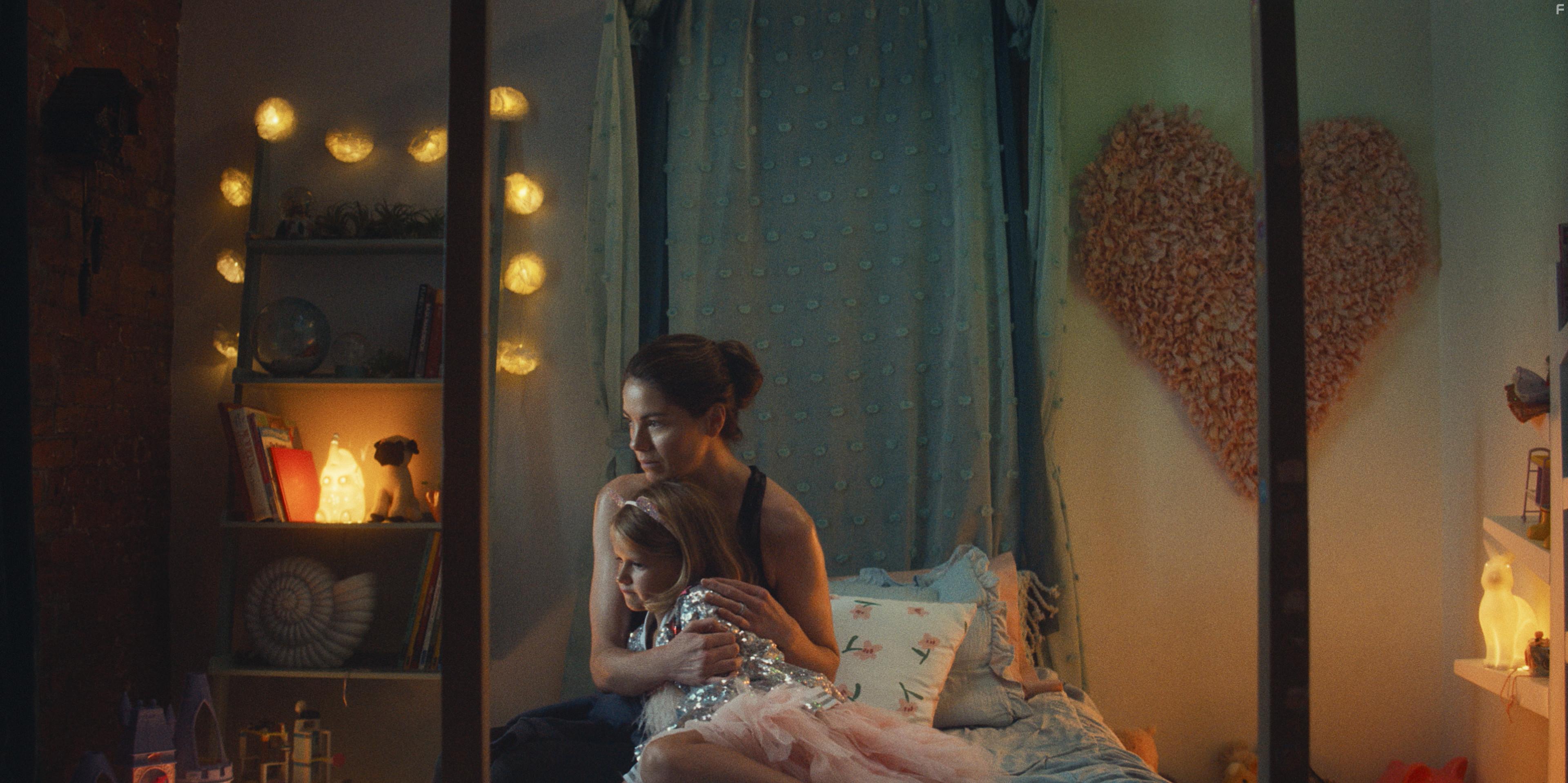 Rose Decker and Michelle Monaghan in Nanny (2022)