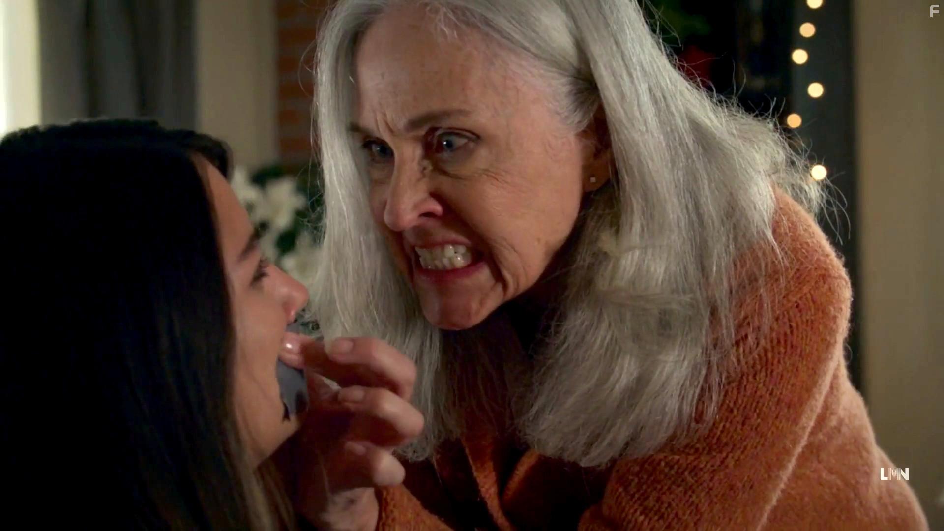 Erin Gray and Cristine Prosperi in It's Beginning to Look a Lot Like Murder (2022)