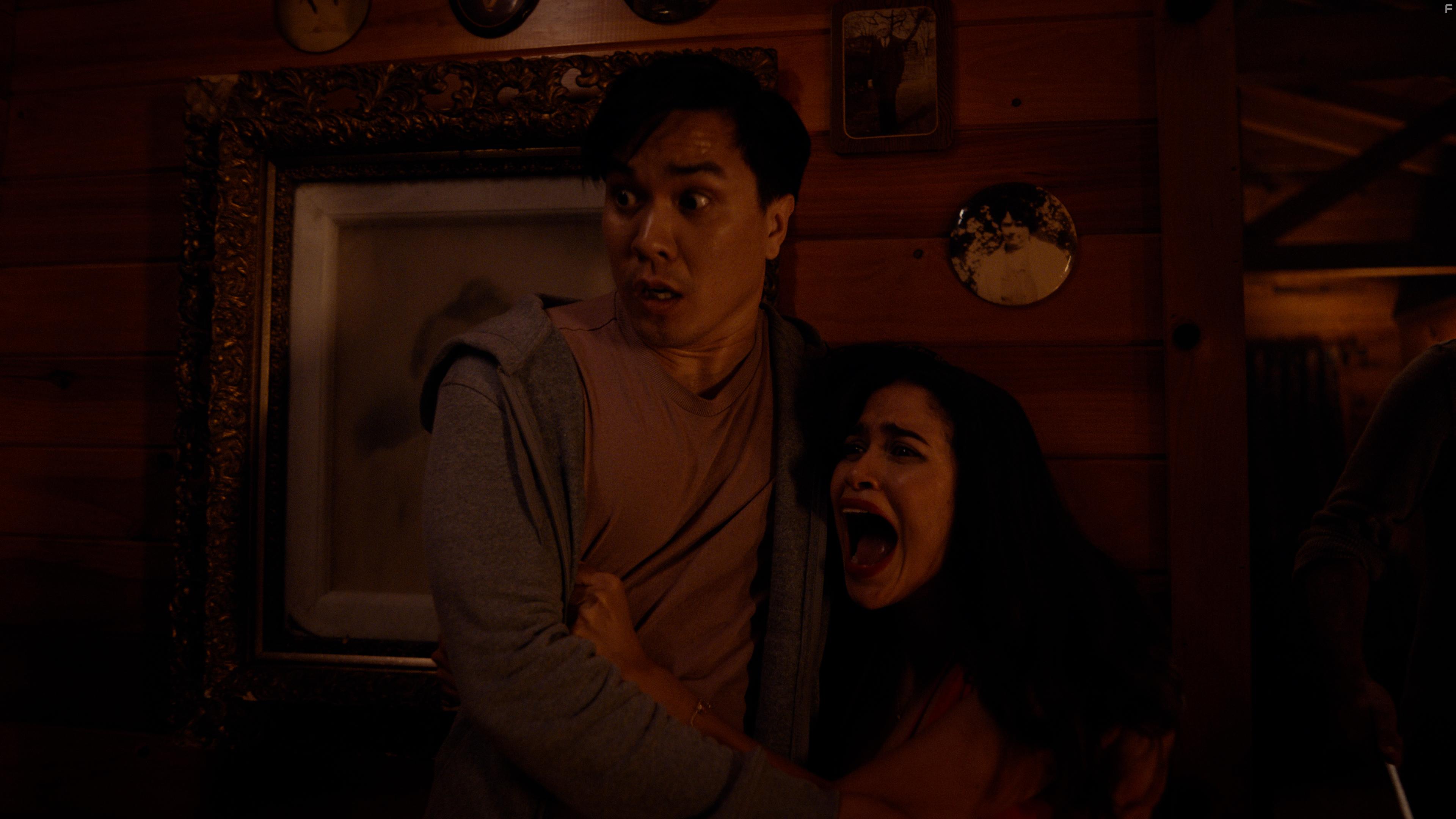 Sheer terror strikes Hunter (Thy Bui) and Holly (Danielia Maximillian)