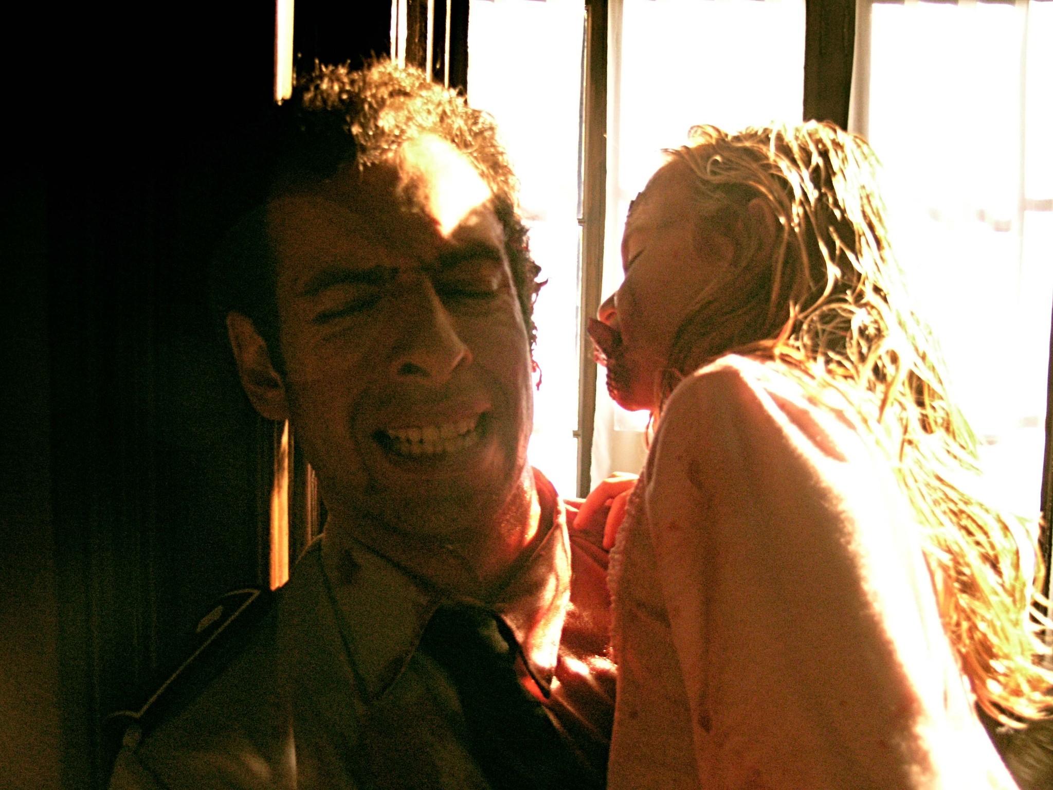 Jorge-Yamam Serrano and Claudia Silva in [Rec] (2007)