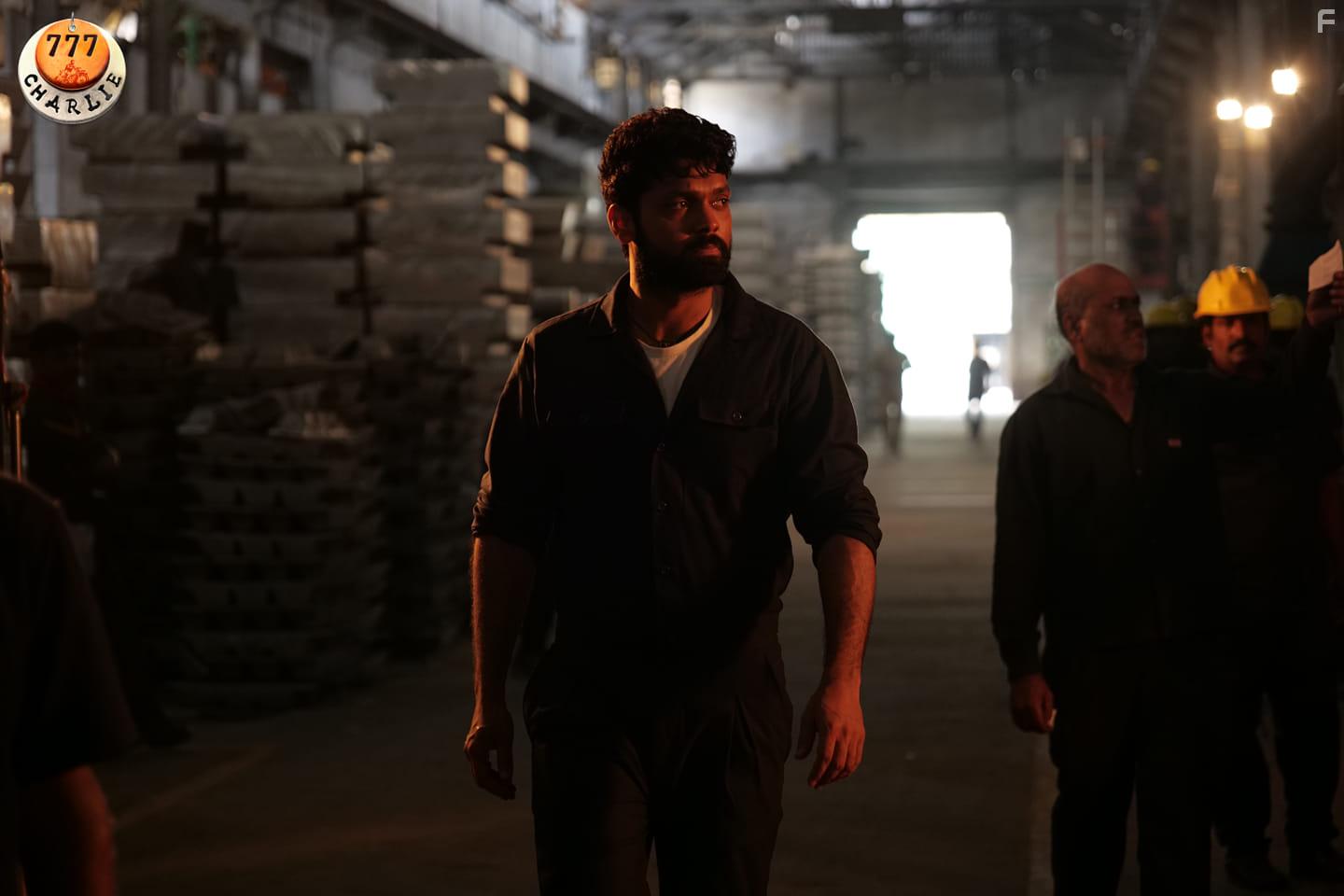 Rakshit Shetty, Kiranraj K, and Charlie in 777 Charlie (2022)