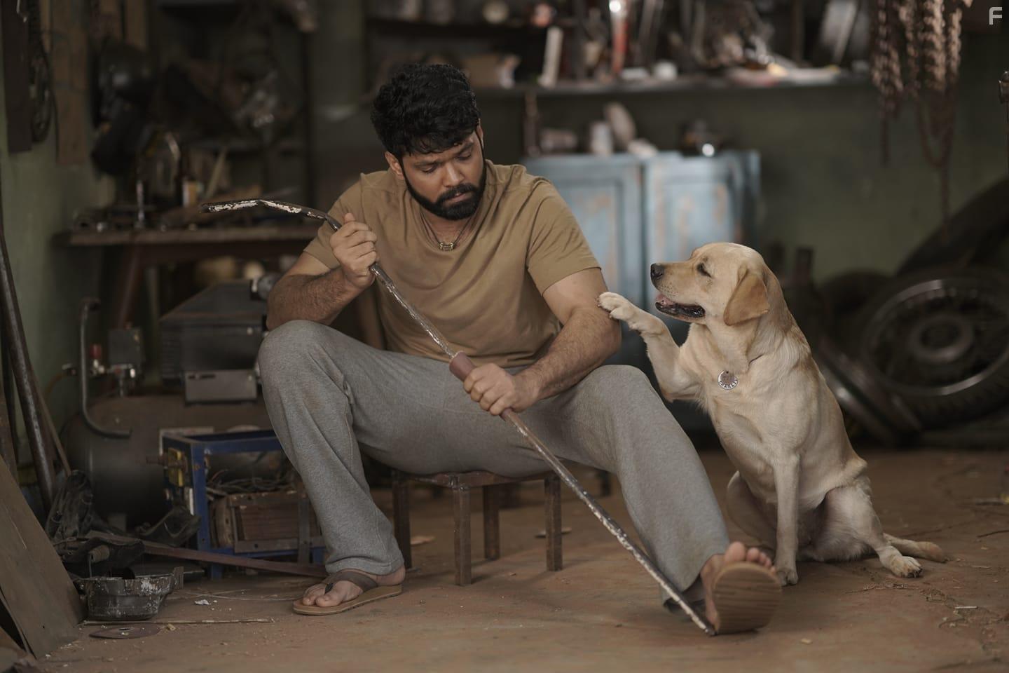 Rakshit Shetty, Kiranraj K, and Charlie in 777 Charlie (2022)