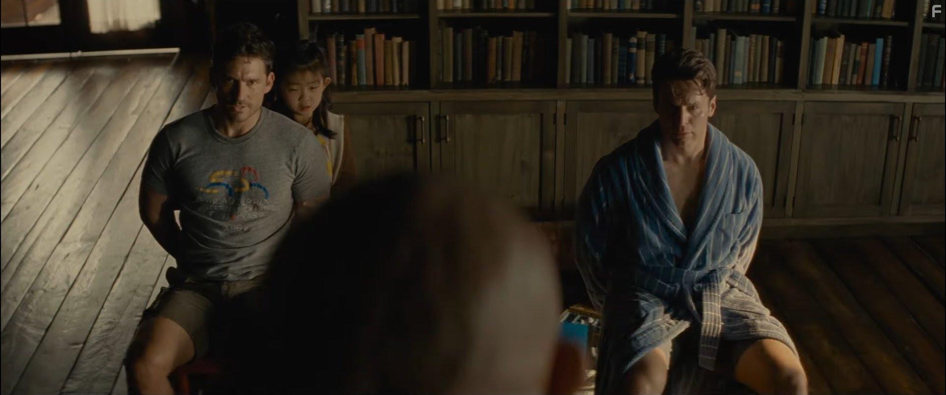 Kristen Cui, Jonathan Groff, and Ben Aldridge in Knock at the Cabin (2023)